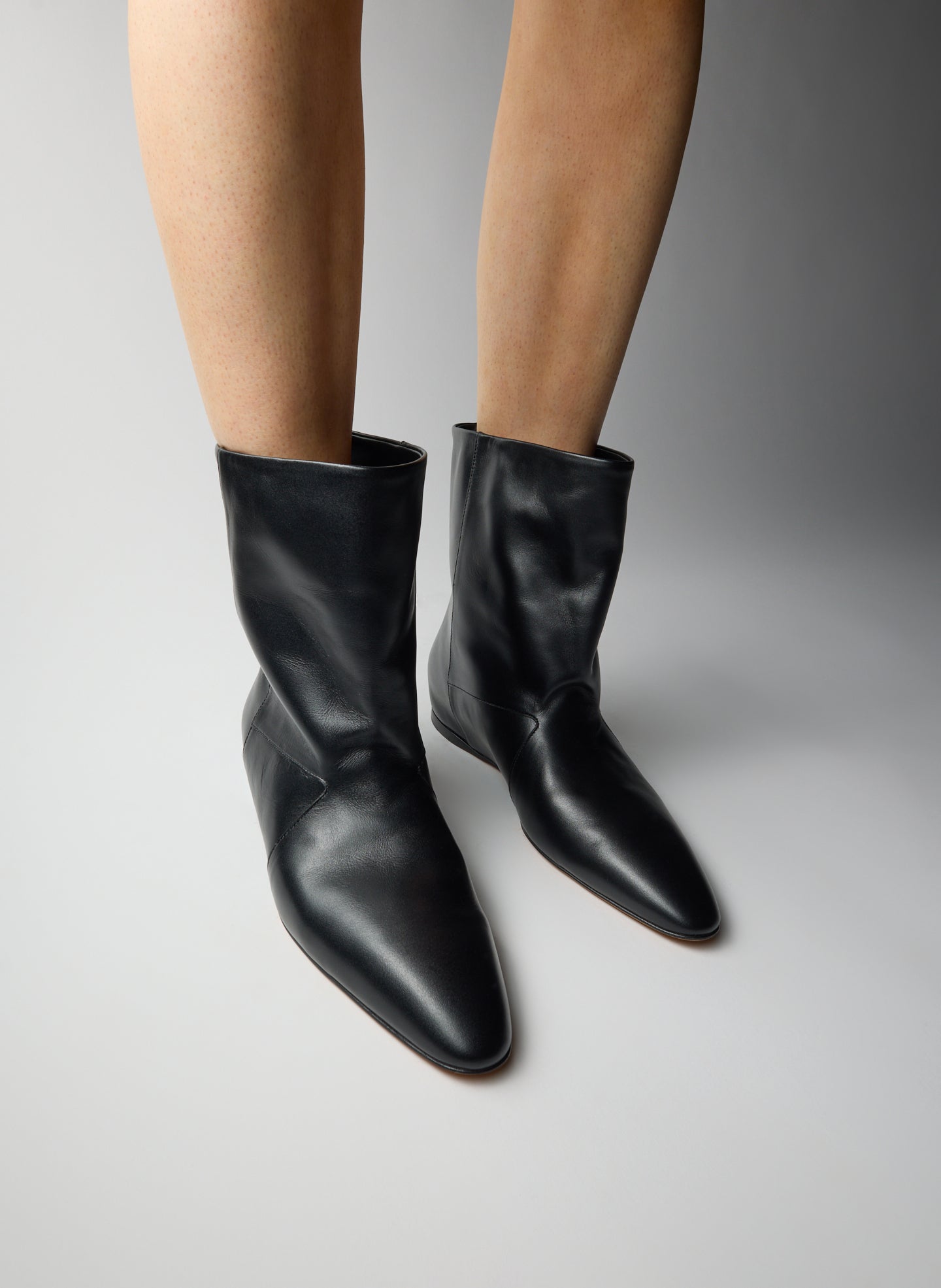 Black Bux Boot - slouchy short leather boot, on model