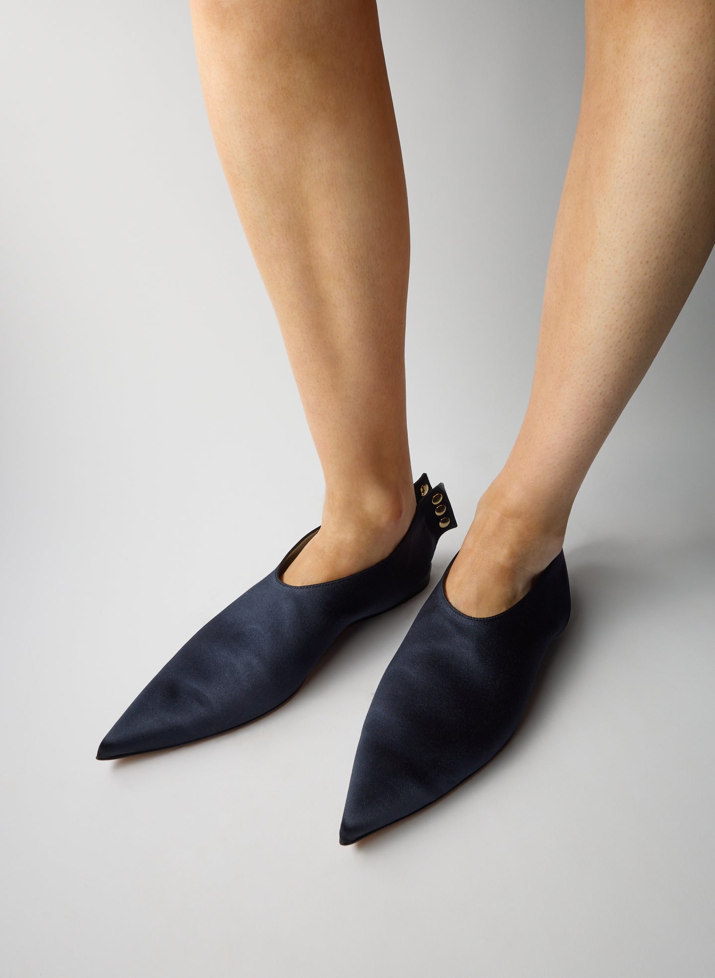 Navy Norbert Satin Flat - pointed toe, on model