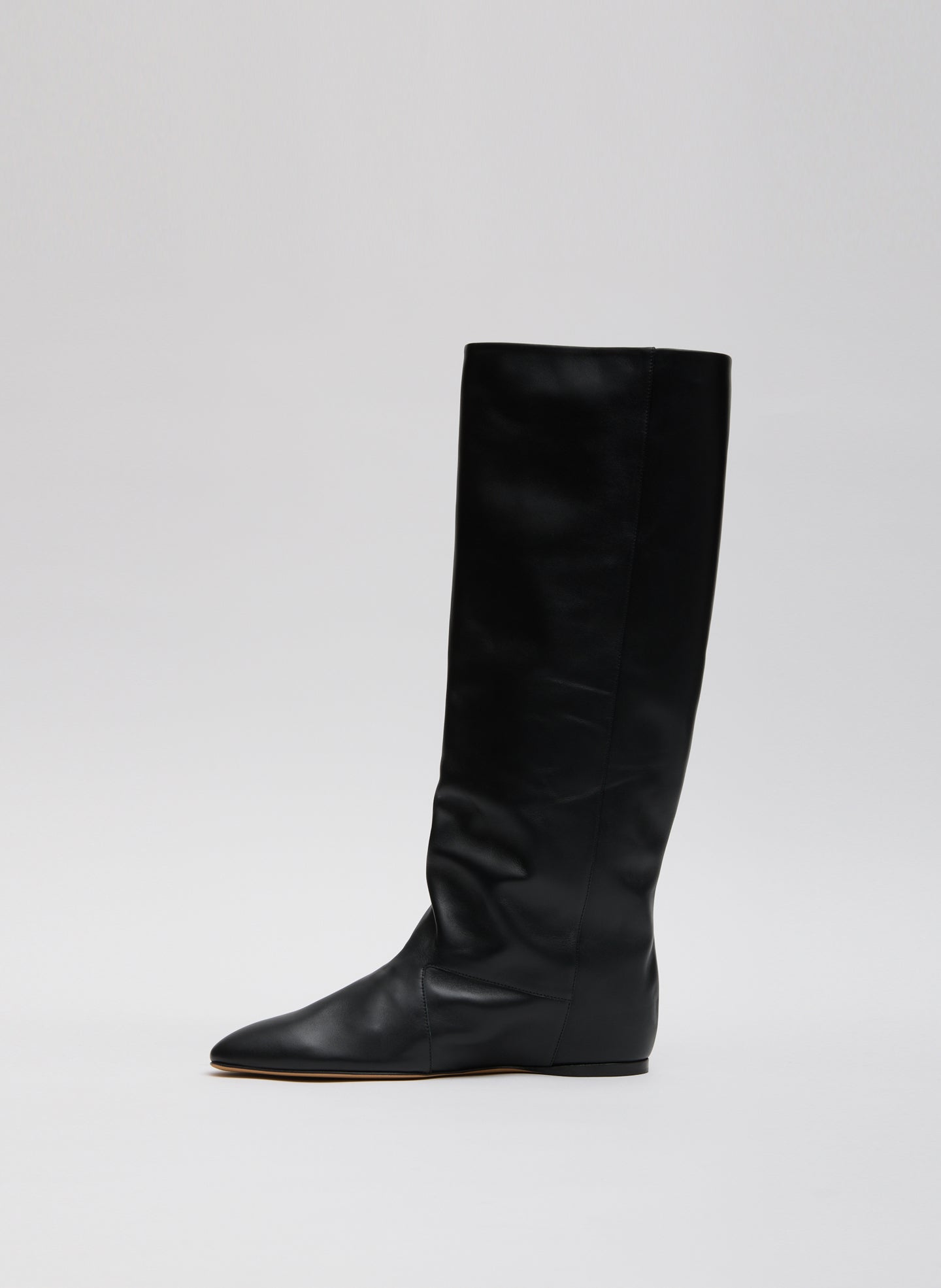 Black Kuda Boot - slouchy, knee-high leather boot, side view