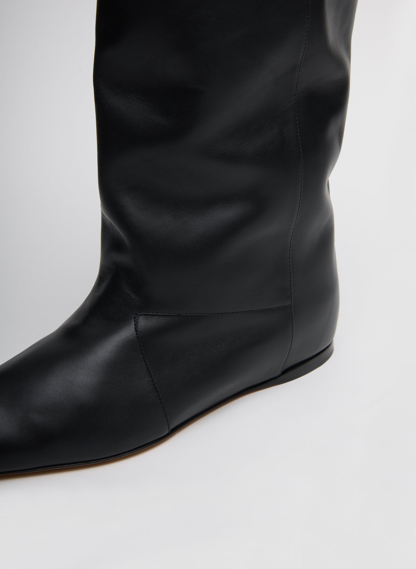 Black Kuda Boot - closeup of leather and stitching detail