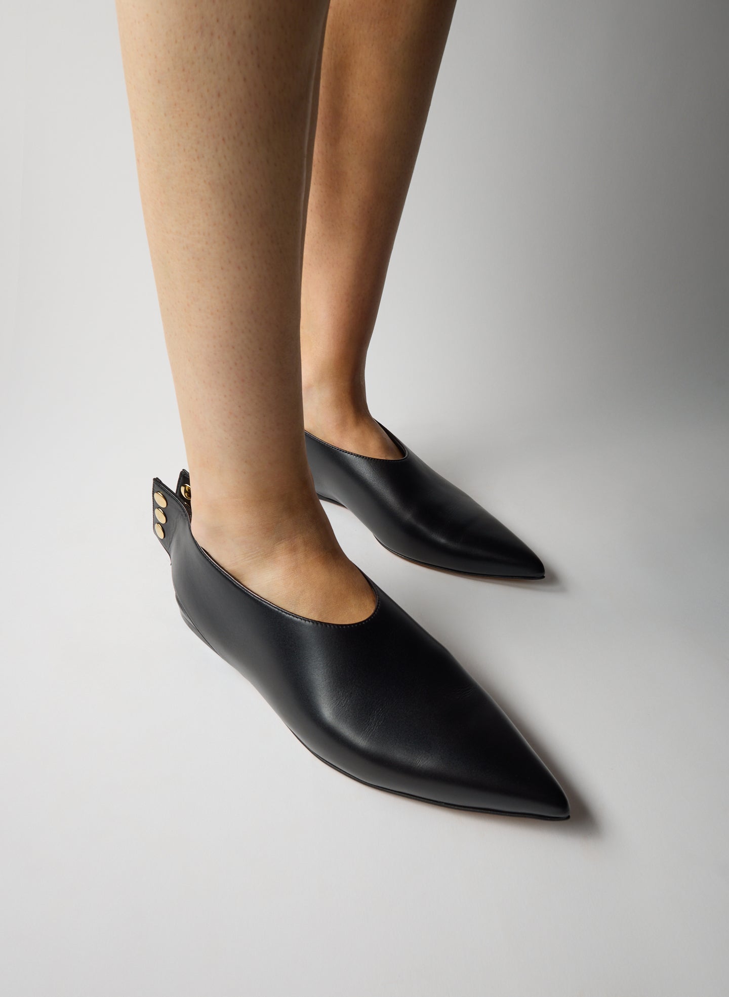 Black Norbert Flat - leather, pointed toe, on model