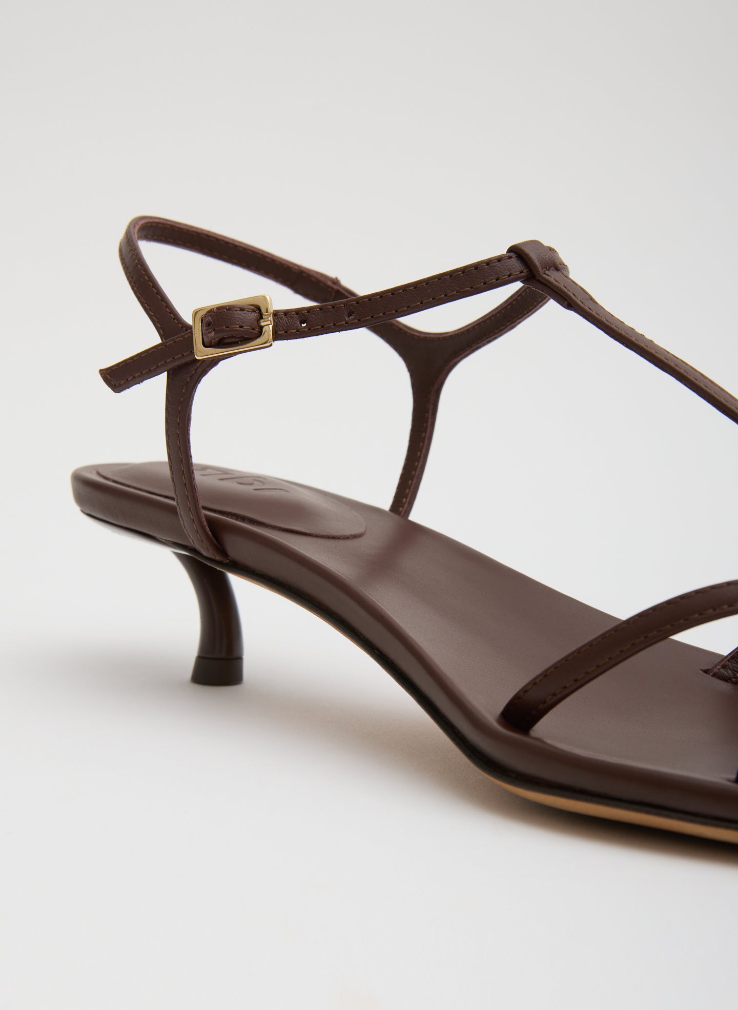 Brown Christopher Heel - closeup of leather strap and buckle detail