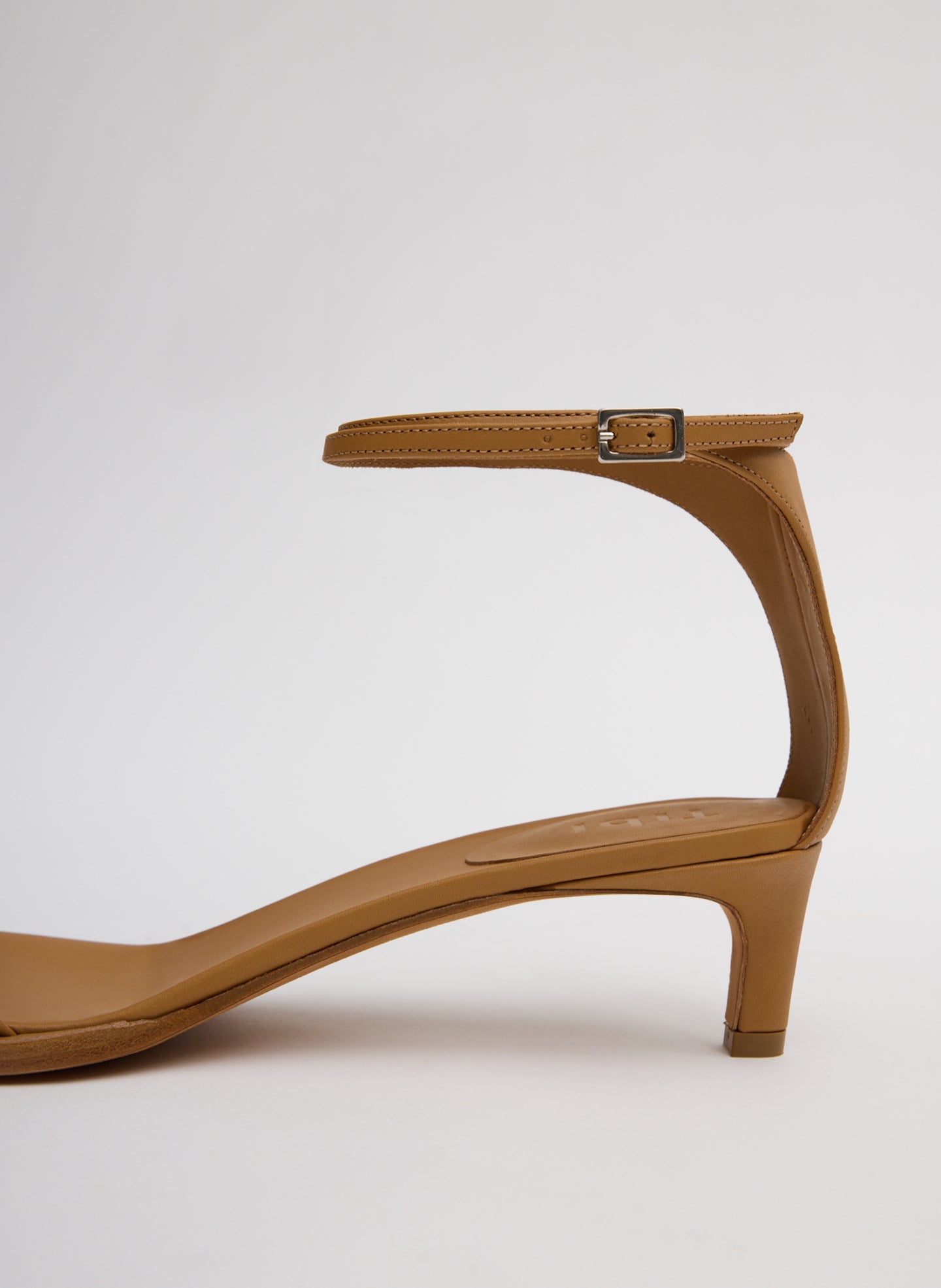Tan Leather Ulrich Heeled Sandal - closeup of ankle strap detail