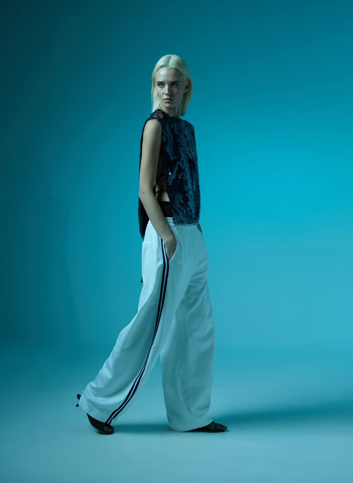 White Active Knit Winslow Pant - barrel leg athleisure track pant, editorial image on model