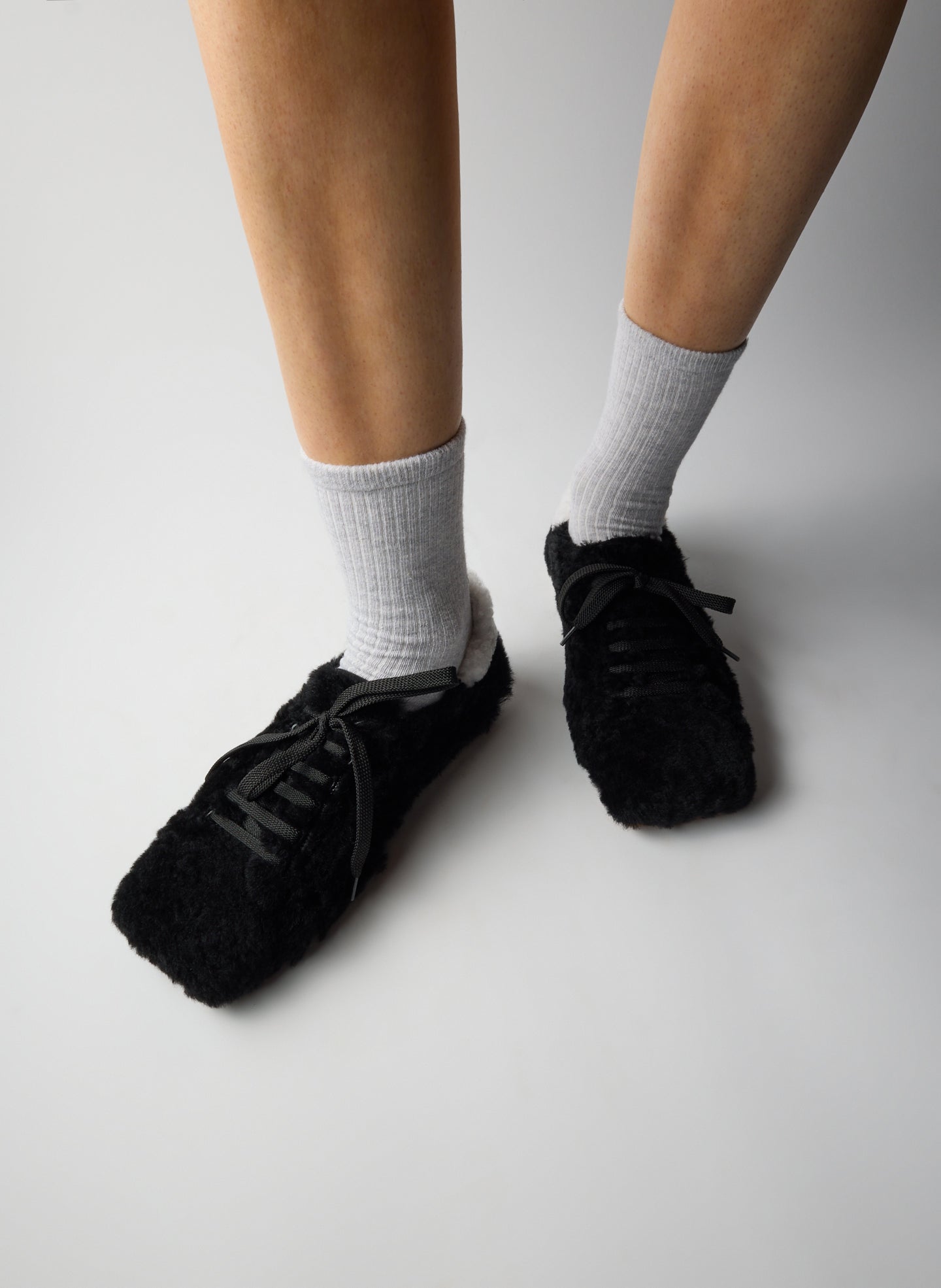 Black and White Teddy Shearling Seth Sneaker - furry, square toe, on model
