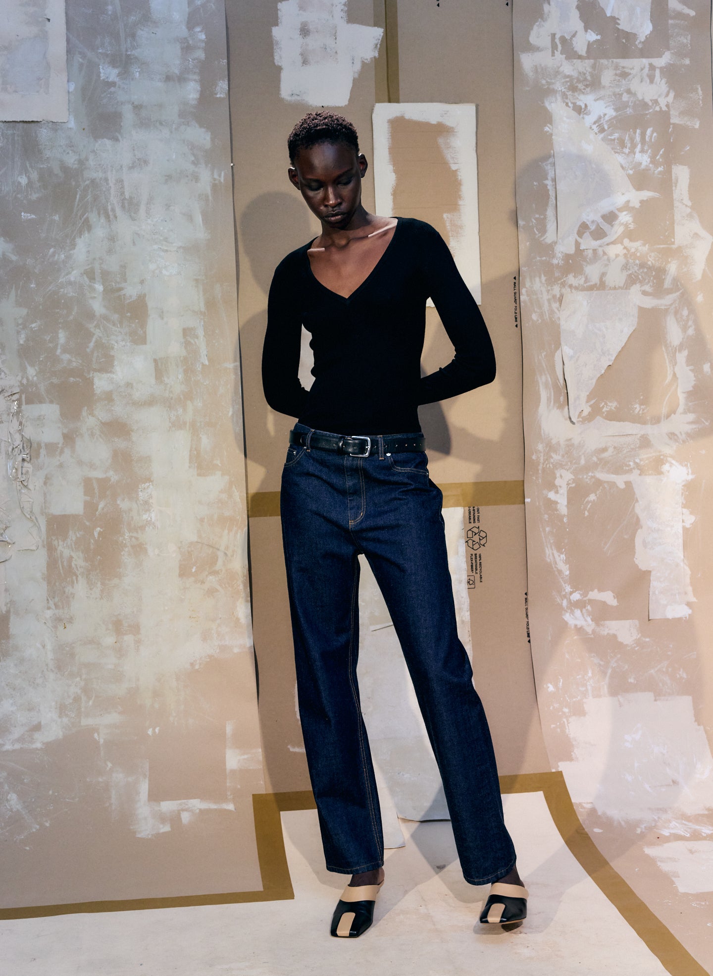 Black Feather Weight Ribbed V-Neck - long sleeve knit top, editorial image on model