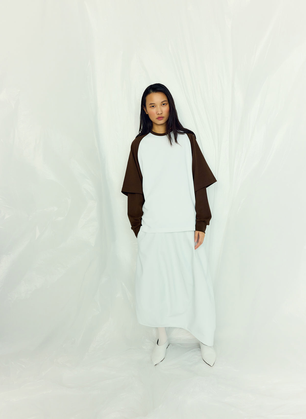 Optic White Leather Asymmetrical Balloon Skirt - editorial campaign on model