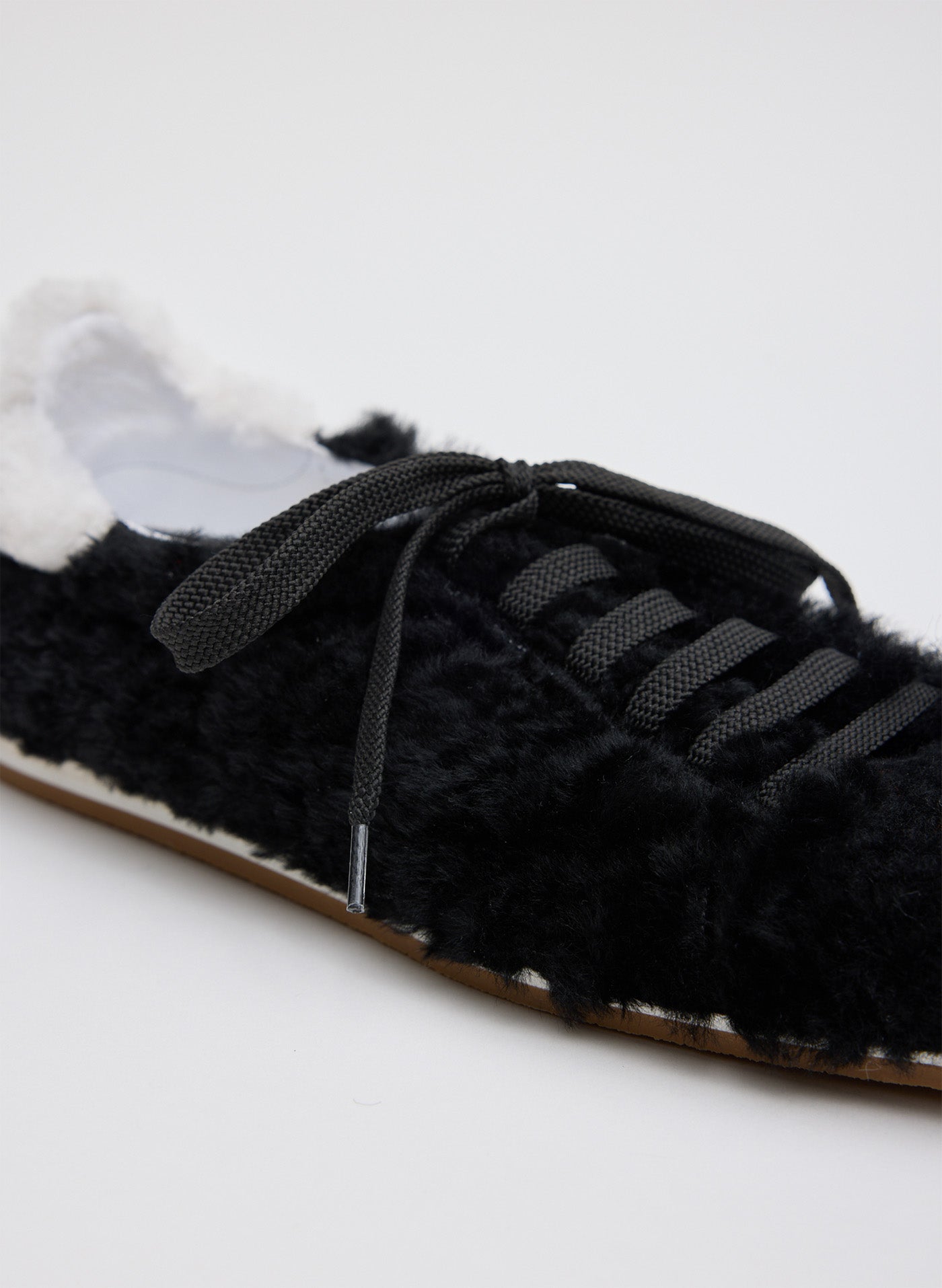 Black and White Teddy Shearling Seth Sneaker - closeup of shearling fabric