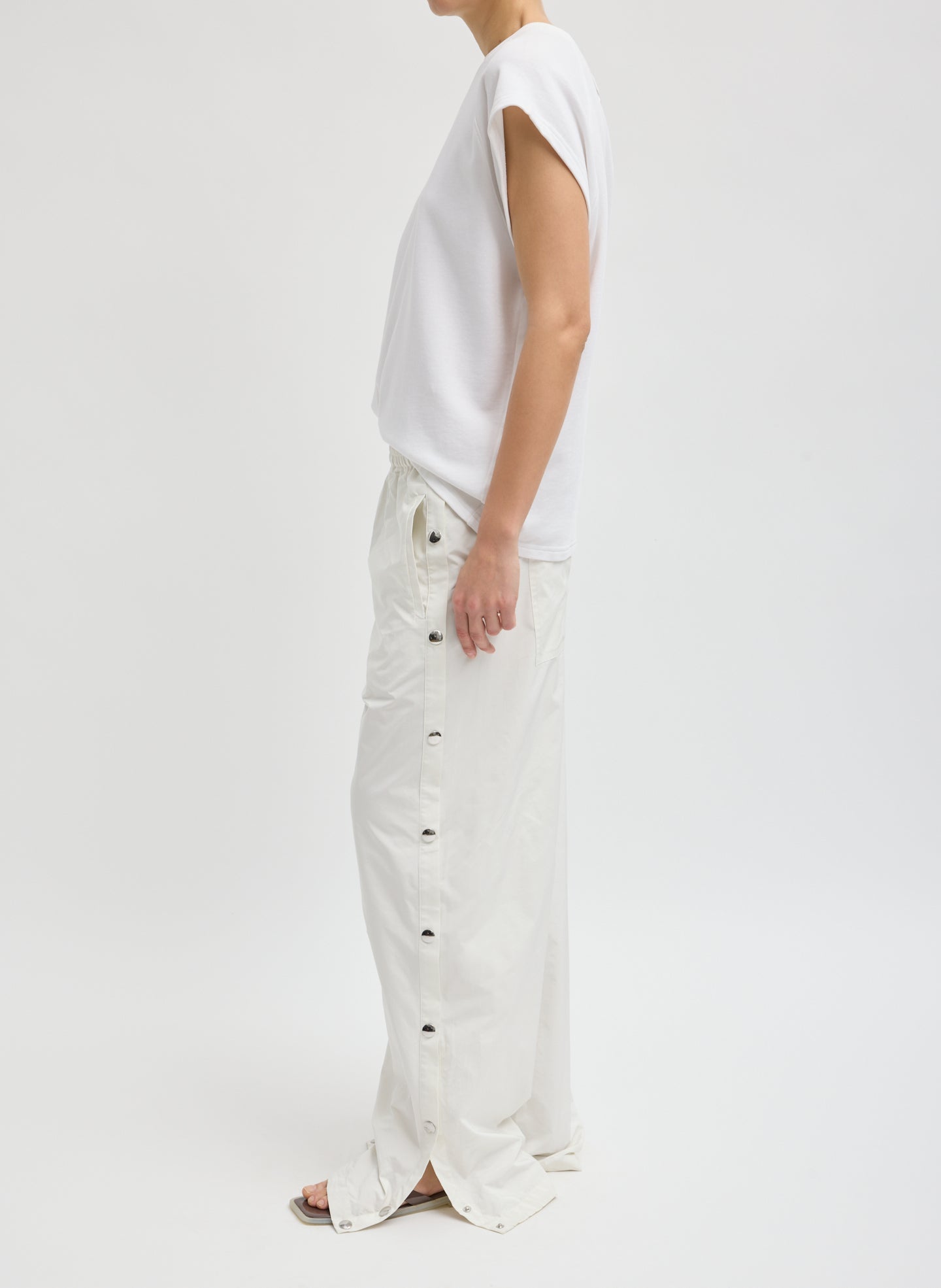 White Nylon Snap Jogger - full look, side view on model