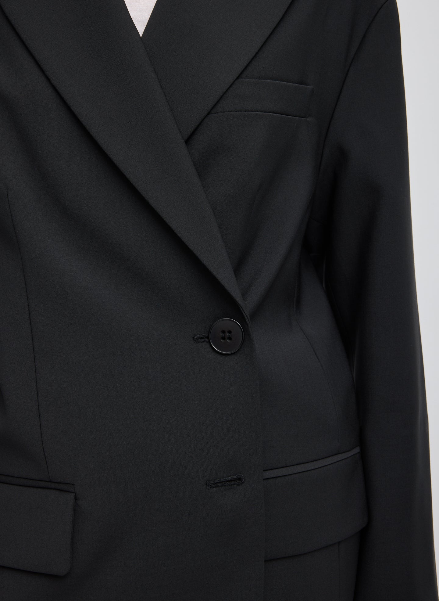 Black Tropical Wool Liam Blazer - closeup of button closure