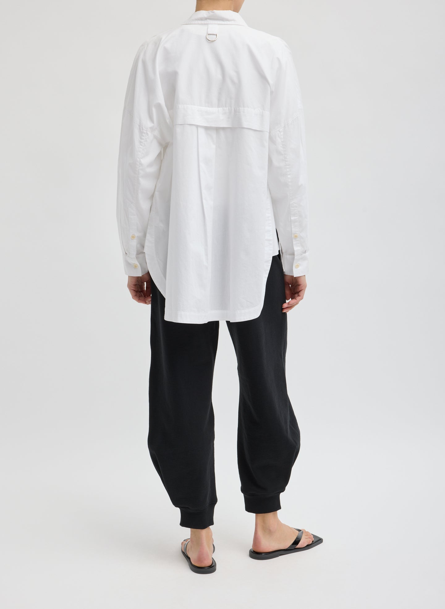 Black Calder Sweatpant - barrel leg sweatpant, back view on model