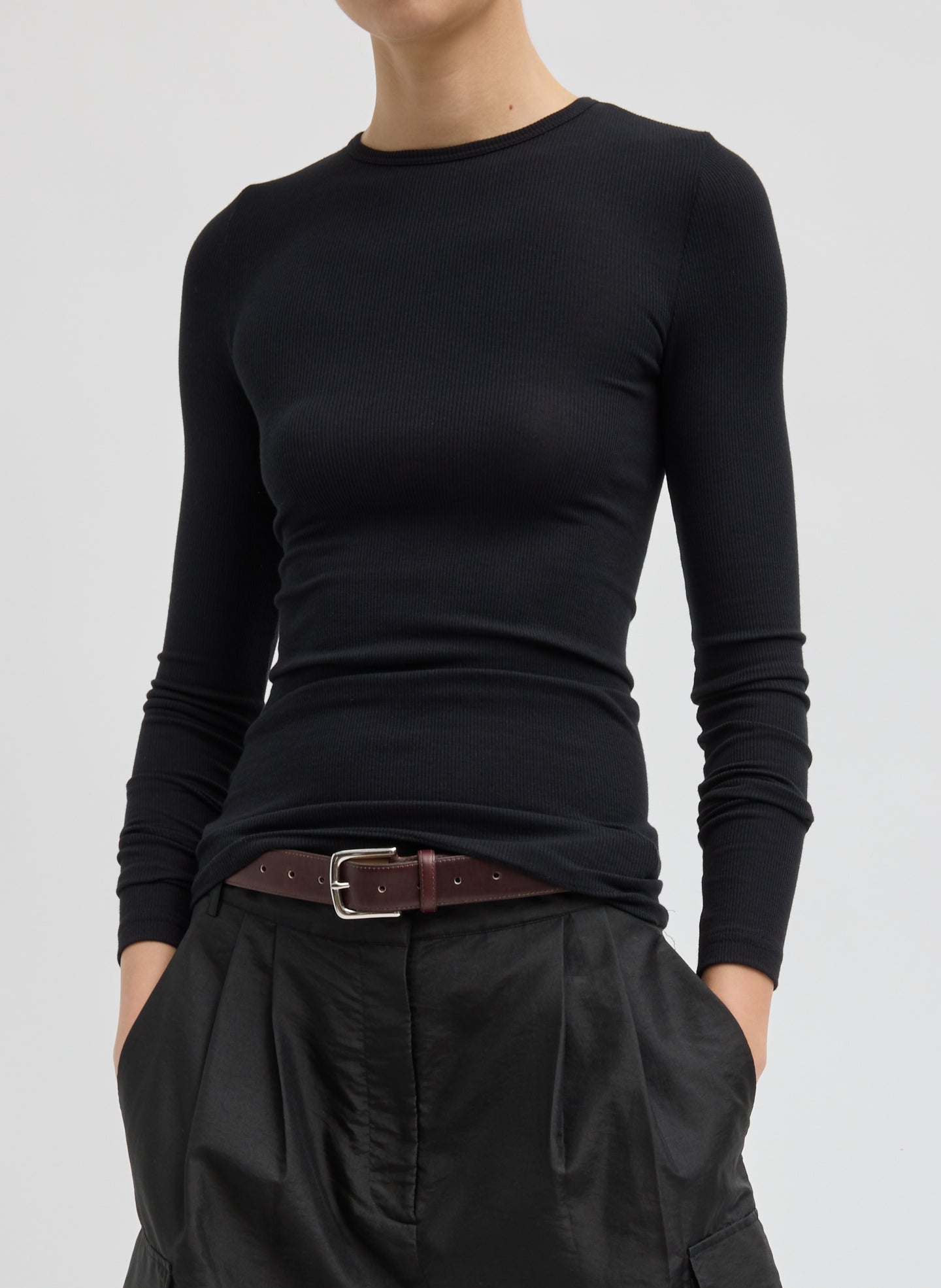 Black Circular Ribbed Crewneck Pullover T-Shirt - long sleeve t-shirt, front view on model