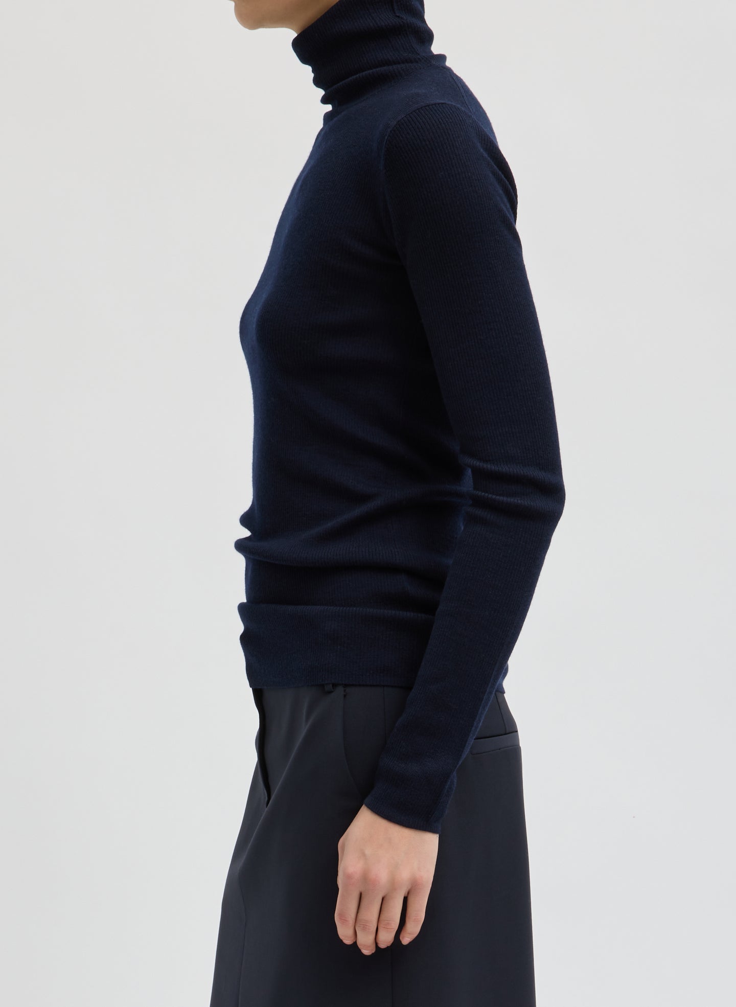 Navy Featherweight Ribbed Sweater Turtleneck Pullover - side view on model