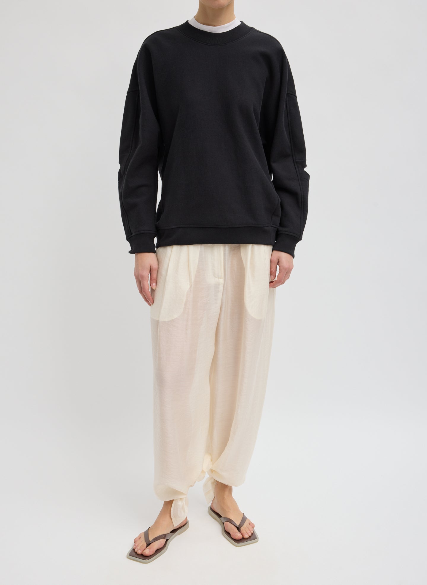 Black Cocoon Crewneck Sweatshirt - full look, front view on model