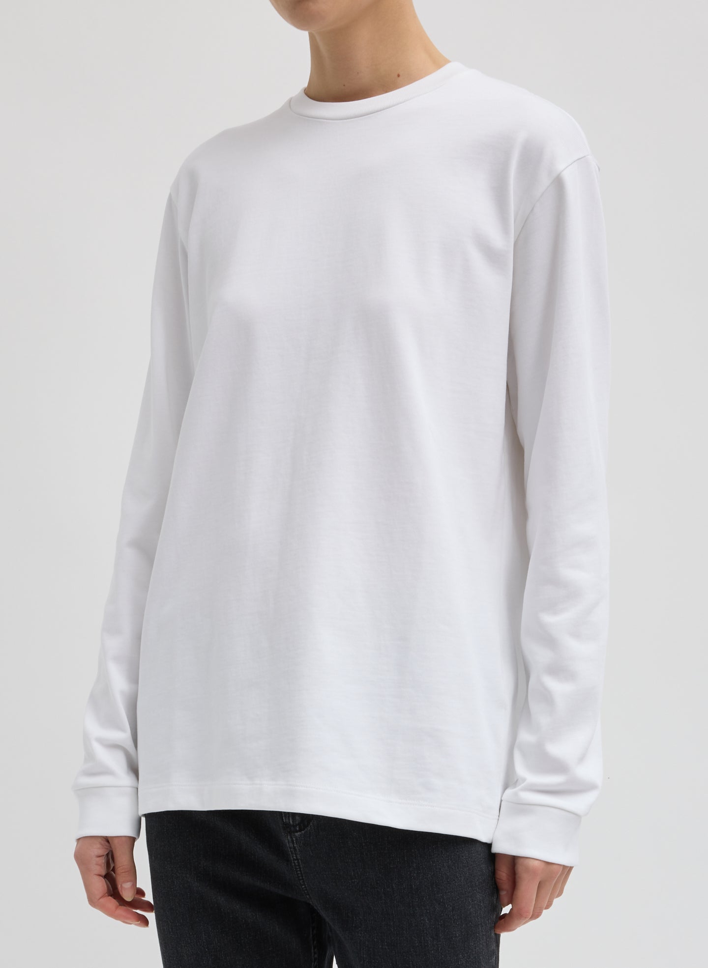 White Perfect Unisex Long Sleeve T-Shirt - front view on model