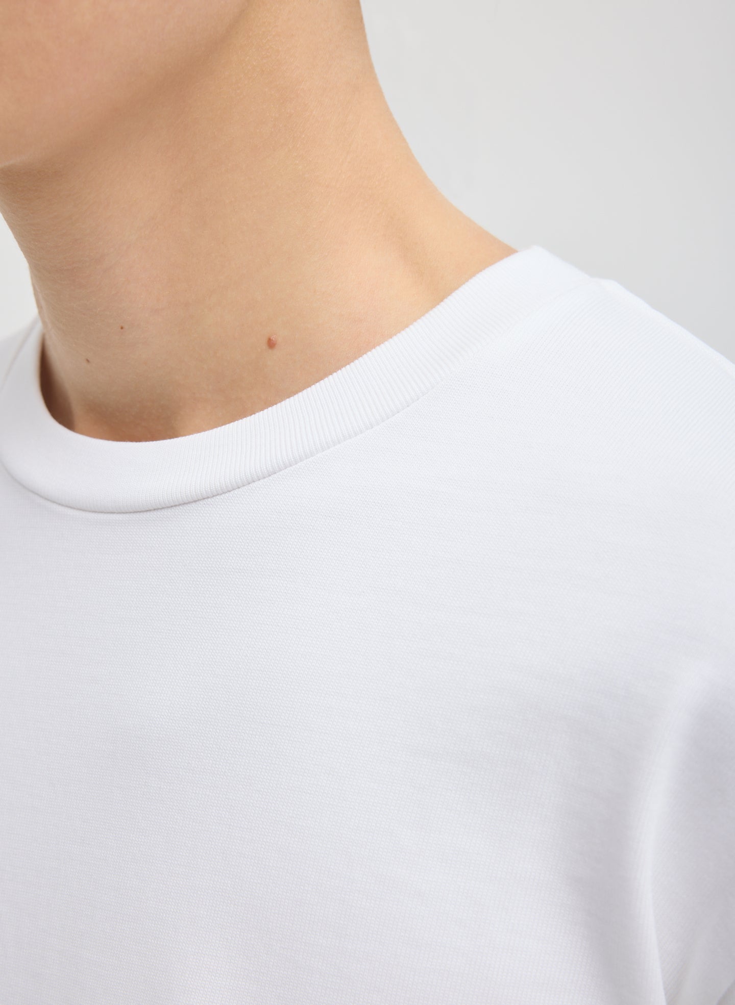 White Perfect Unisex Long Sleeve T-Shirt - closeup of neckline
