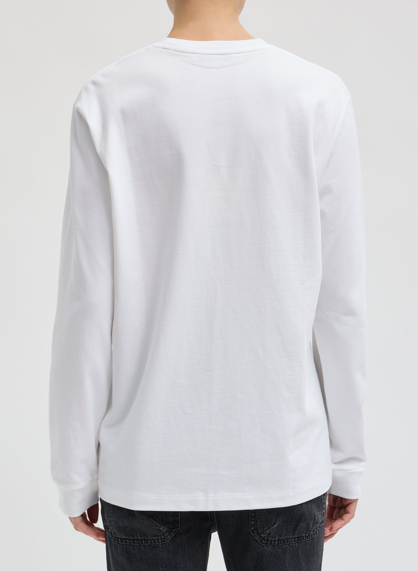 White Perfect Unisex Long Sleeve T-Shirt - back view on model