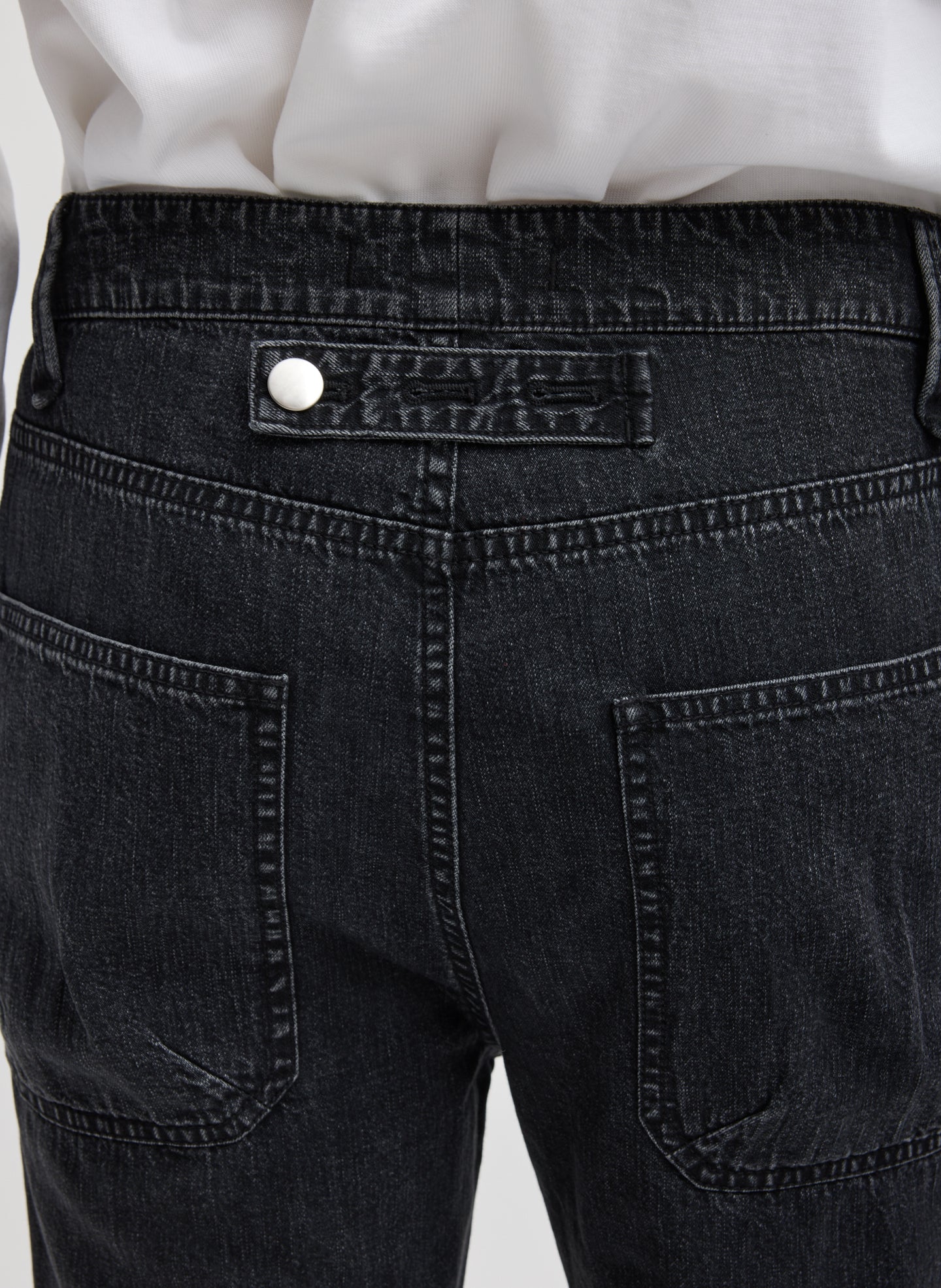 Black Mou Denim Clift Jean - closeup of adjustable back belt