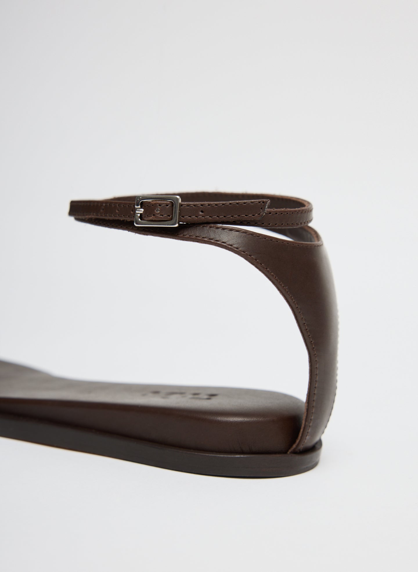 Dark Brown Aldwyn Leather Sandal - closeup of buckle strap detail