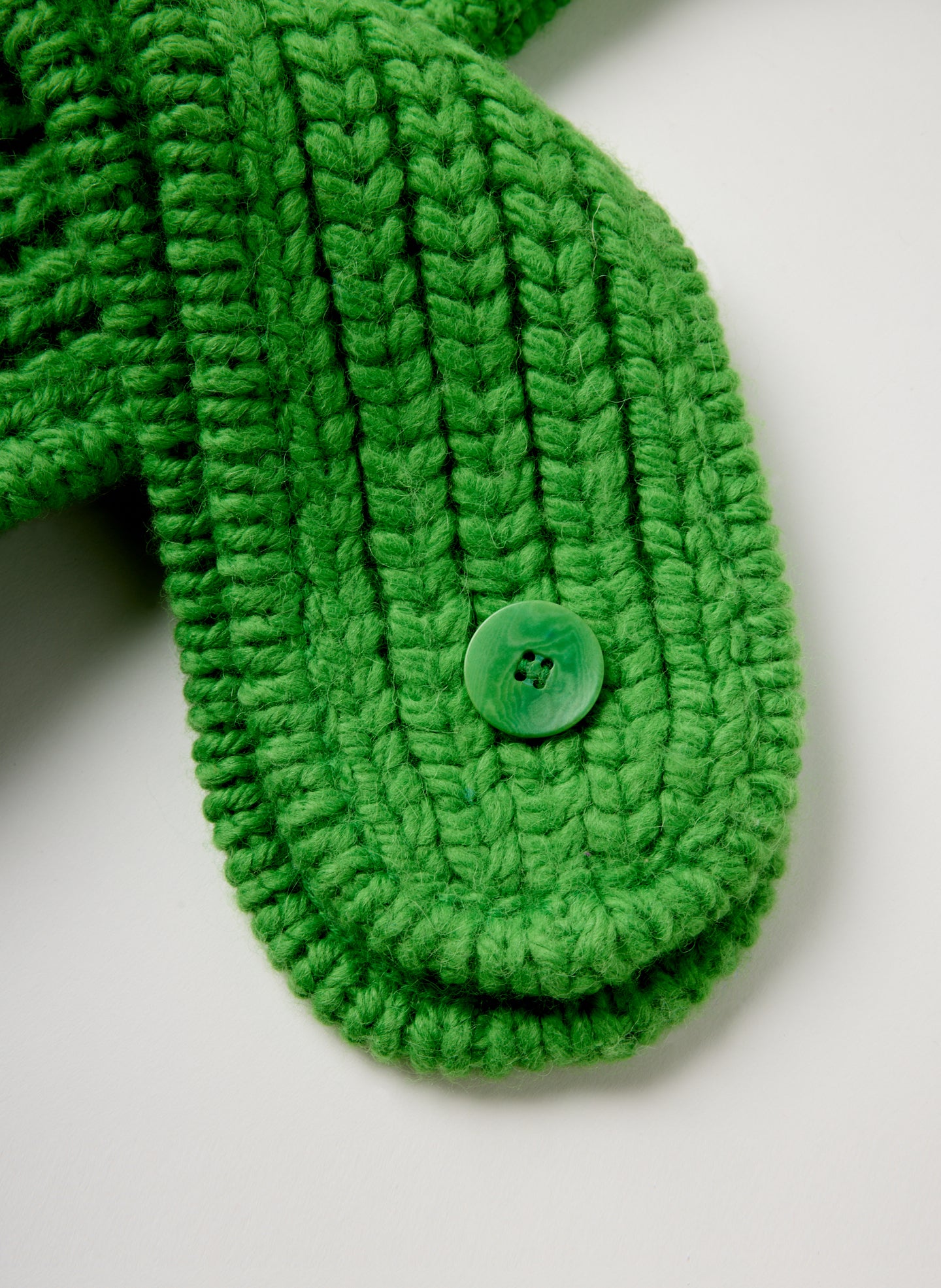 Green Cozy Trapper Scarf Hat - closeup of button closure