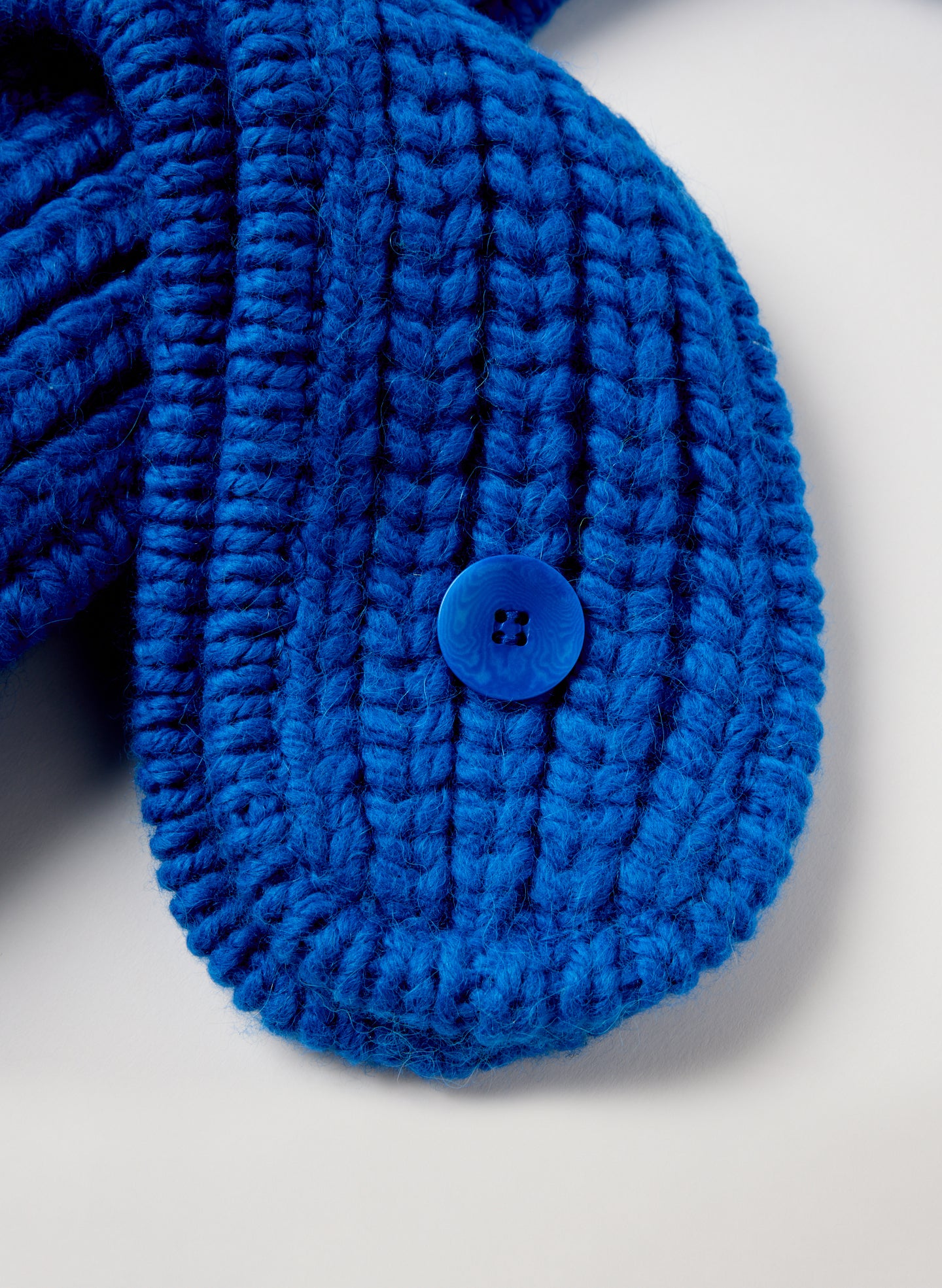 Blue Cozy Trapper Scarf Hat -closeup of button closure