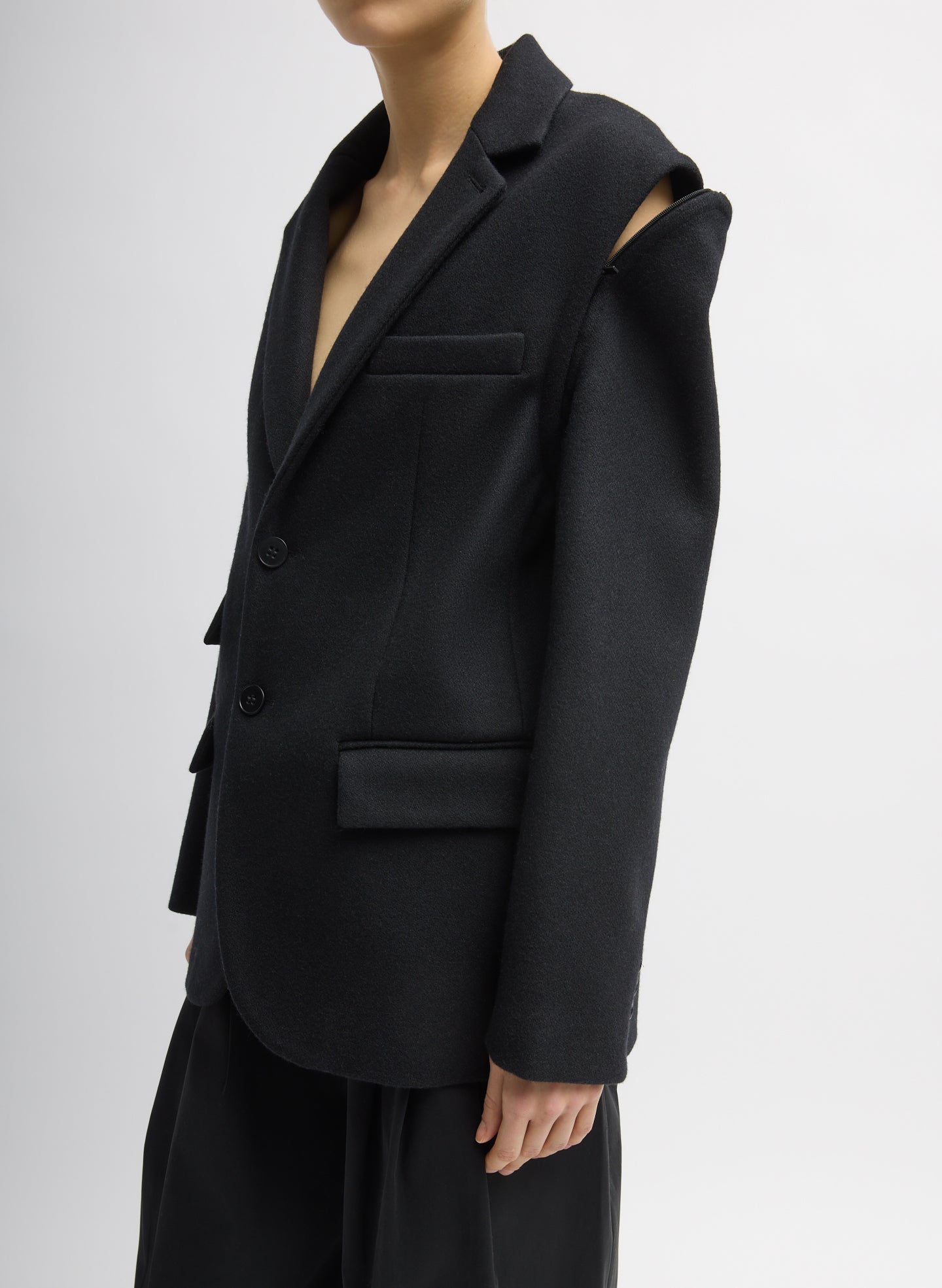 Black Bonded Recycled Felted Wool Convertible Blazer - closeup, three-quarter view on model