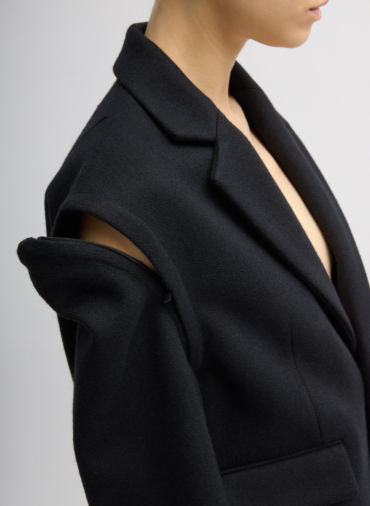 Black Bonded Recycled Felted Wool Convertible Blazer - closeup of unzipped shoulder detail
