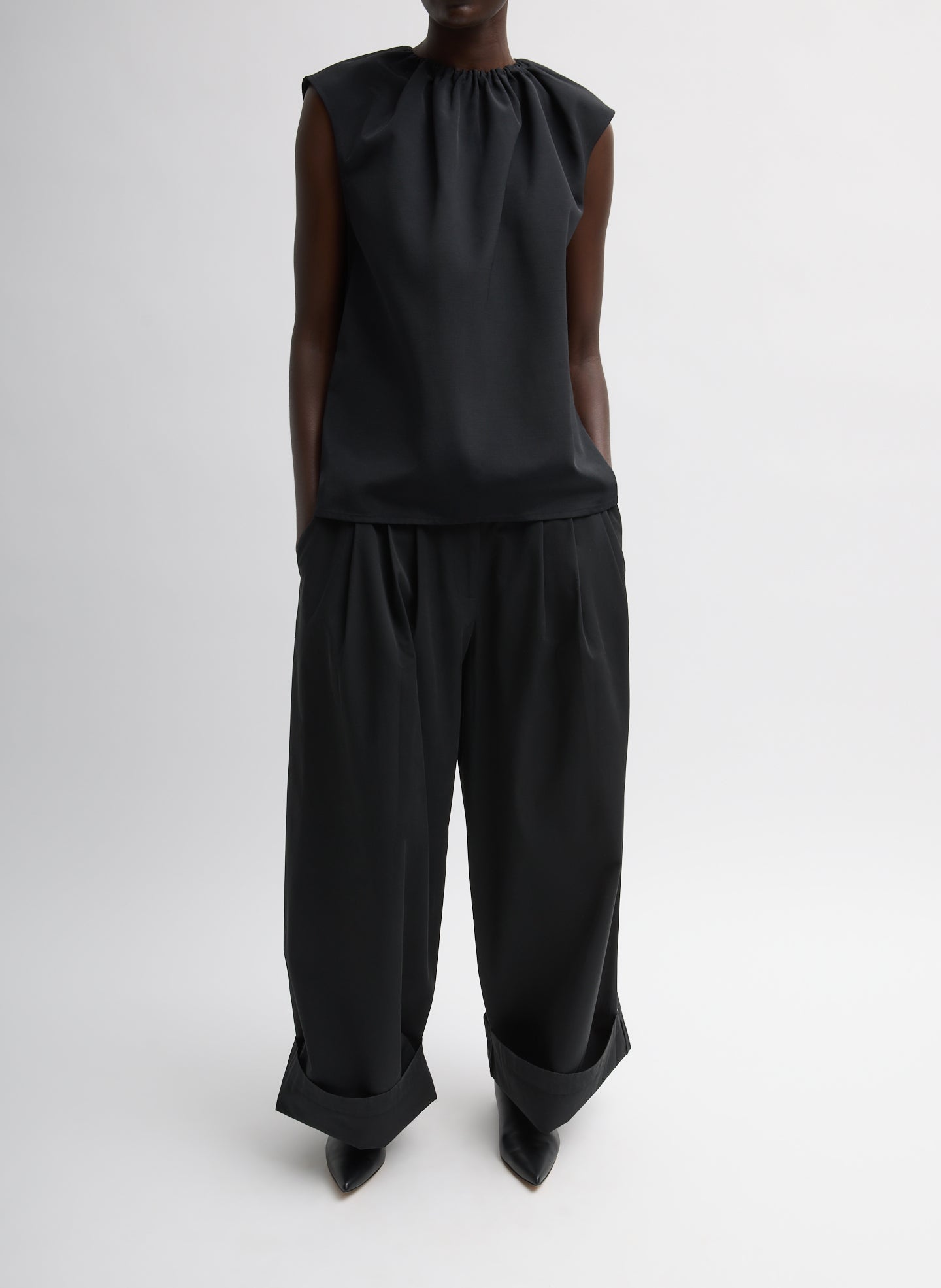 Black Bio Twill Triple Pleat Pant - cuffed leg, front view on model