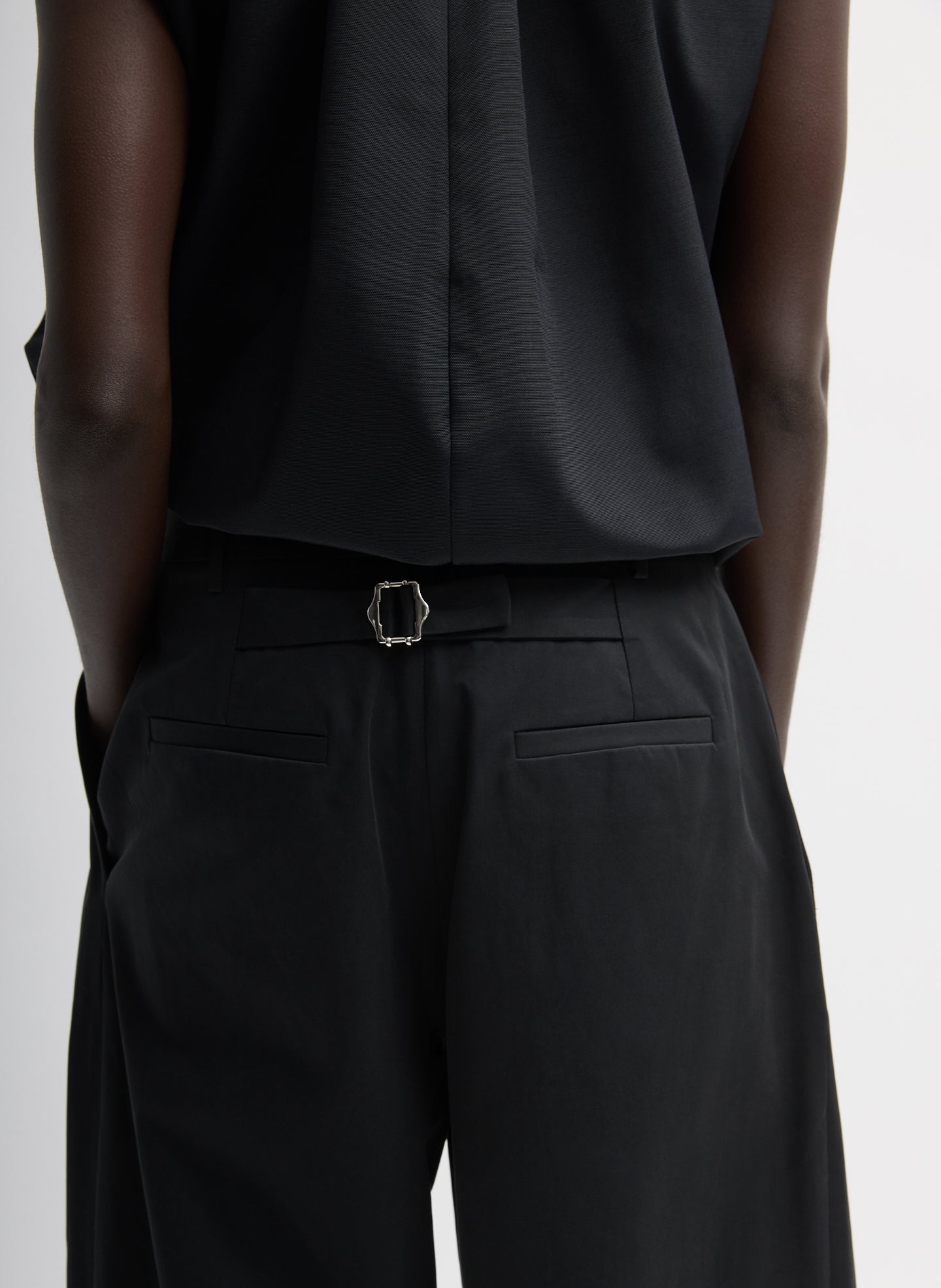Black Bio Twill Triple Pleat Pant - closeup of back belt detail