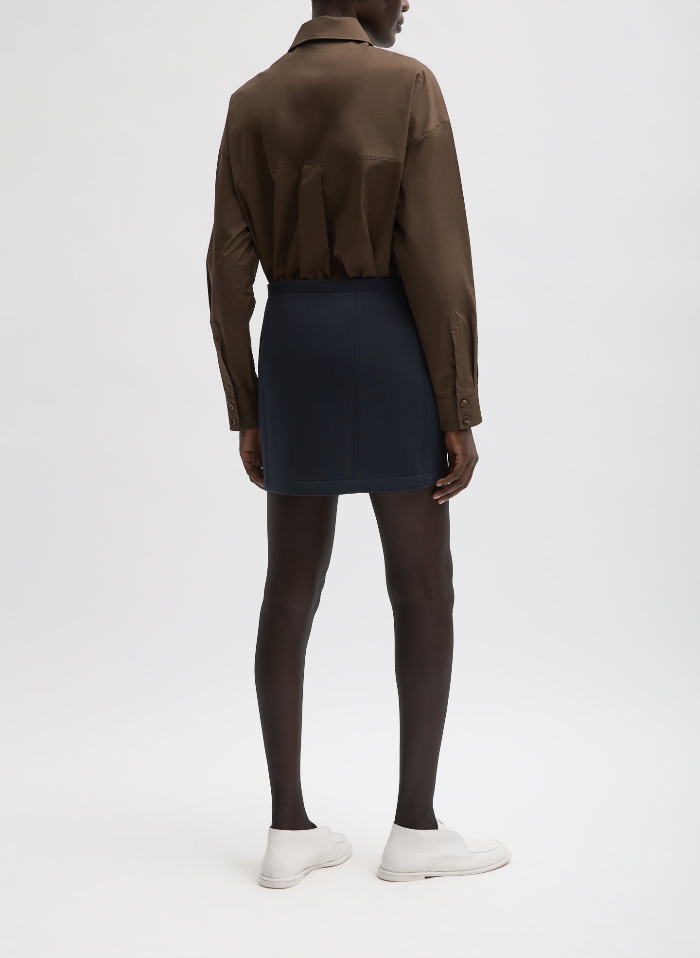 Navy Bonded Twill Mini Skirt - full look, back view on model