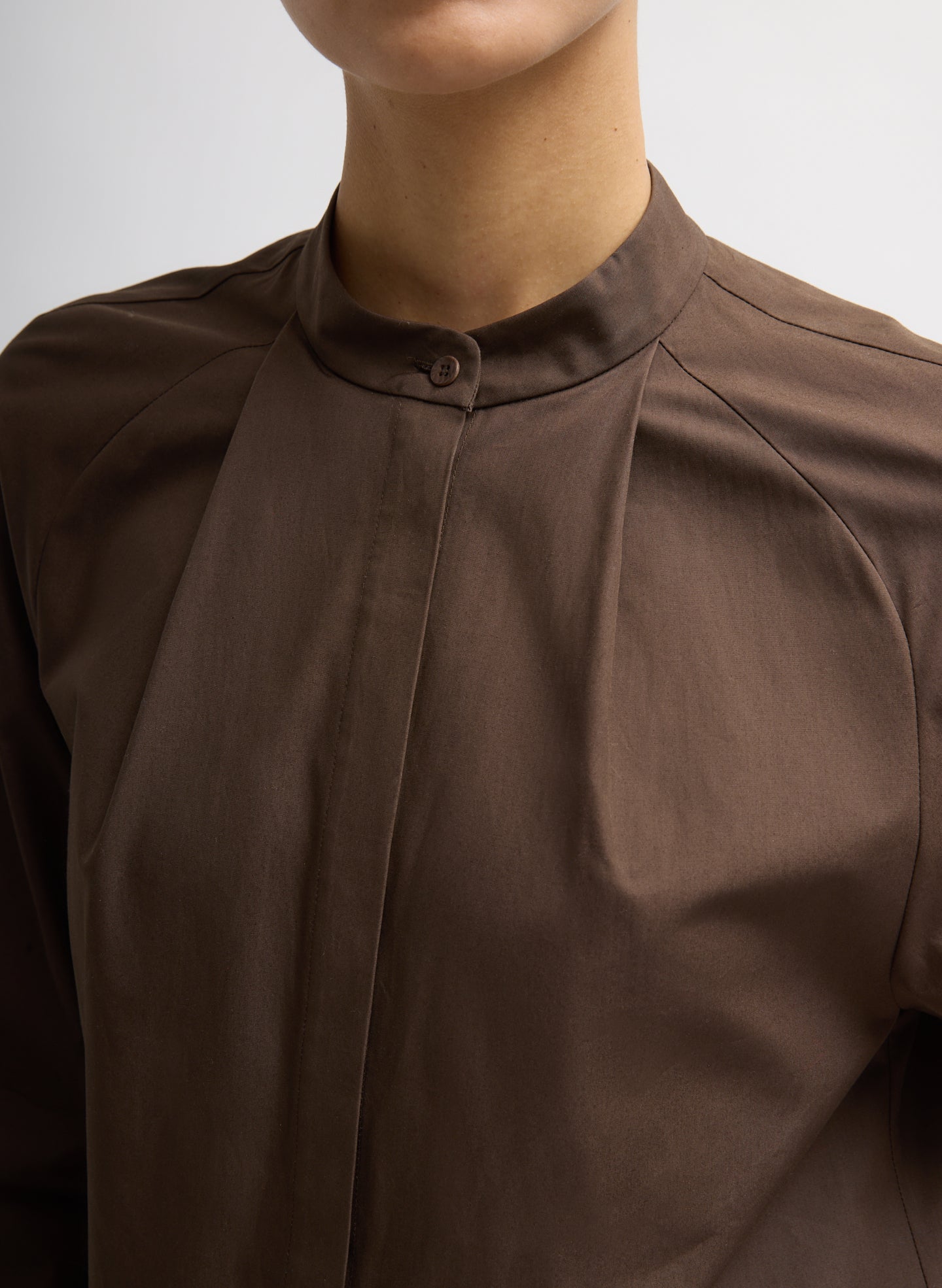 Brown Compact Eco Poplin Balloon Dress - closeup of neckline button detail