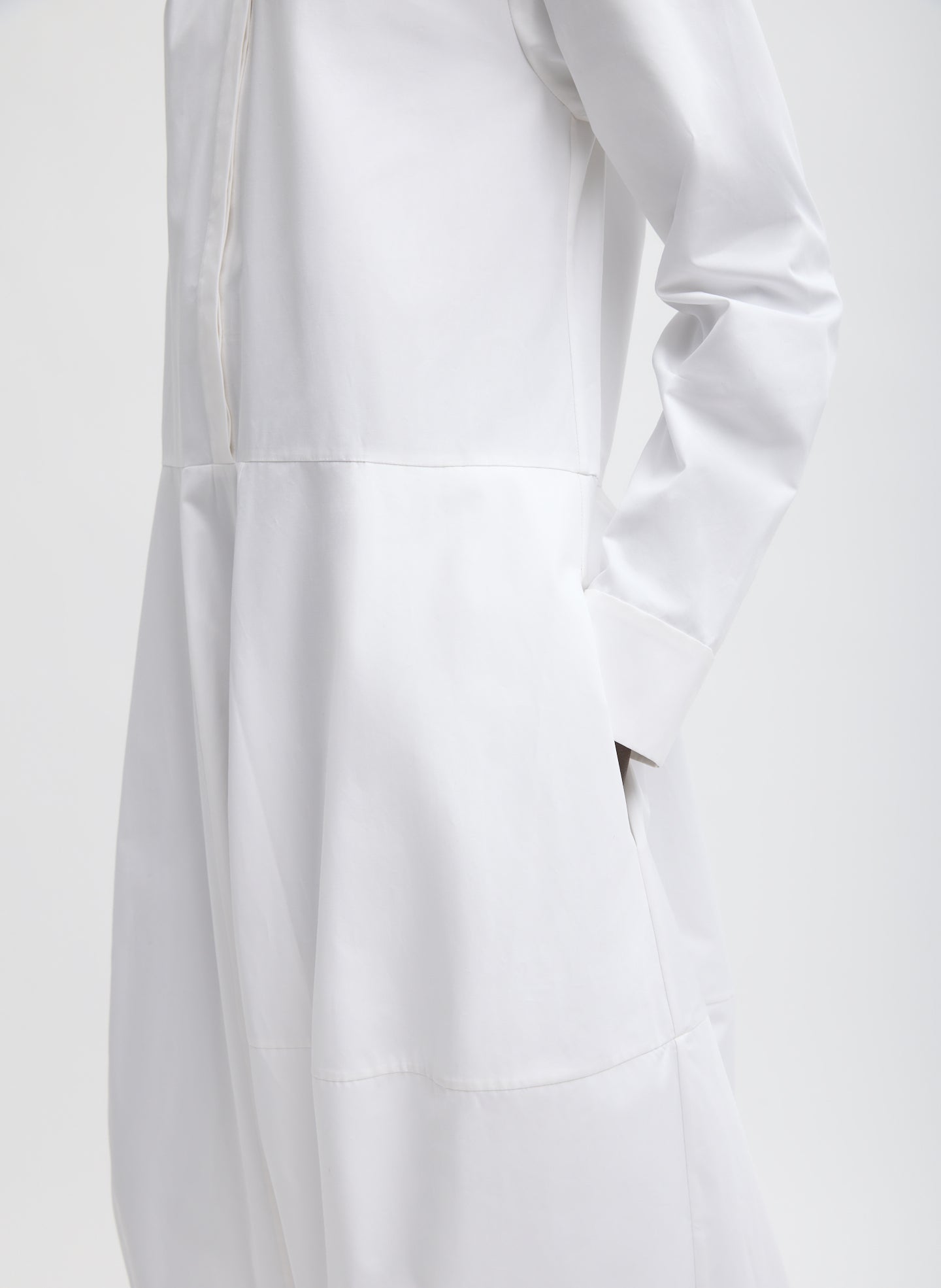 White Compact Eco Poplin Balloon Dress - closeup of fabric seam detail
