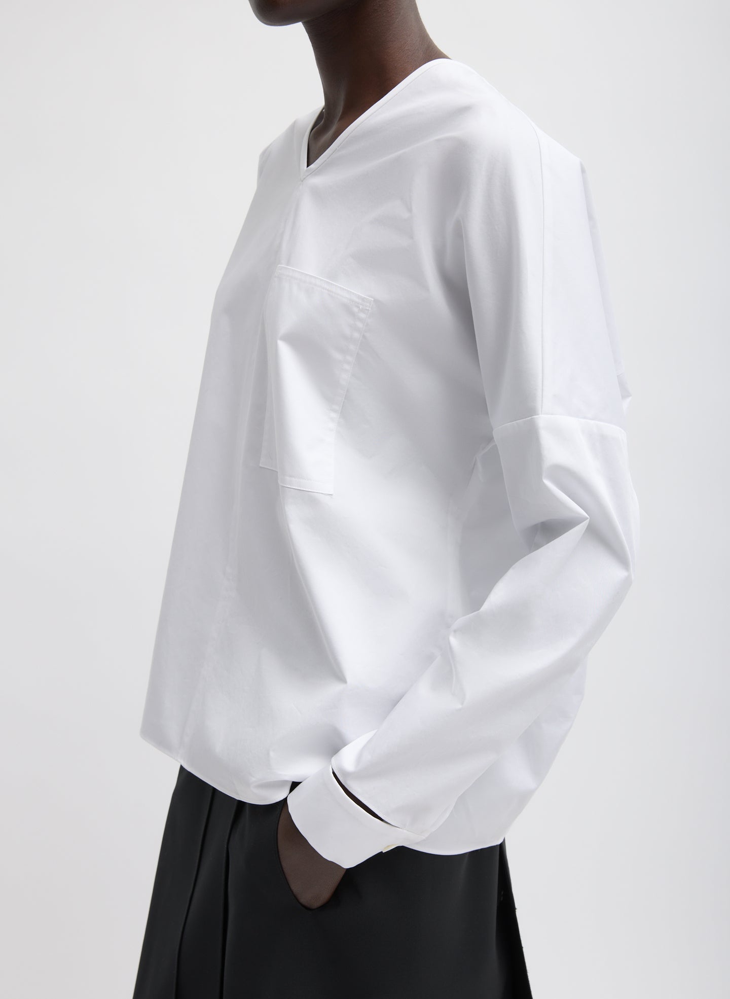 White Eco Poplin V-Neck Dolman Top - side view on model