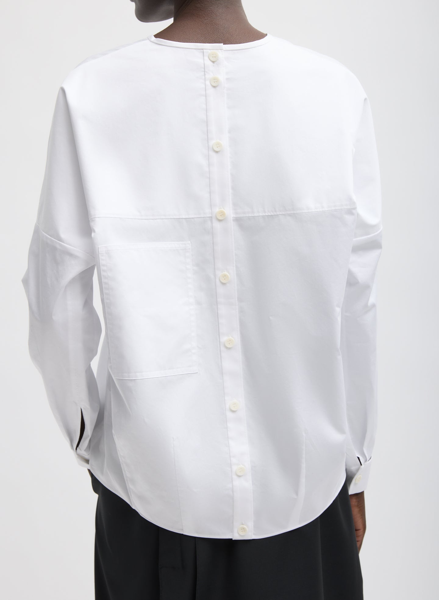 White Eco Poplin V-Neck Dolman Top - back view on model