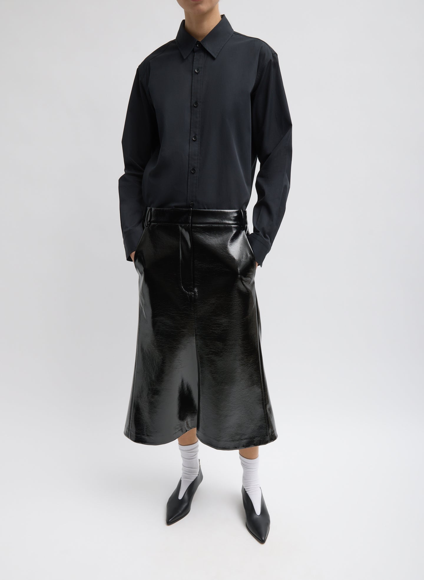 Black Faux Patent Leather Sculpted Silke Skirt - full look, front view on model