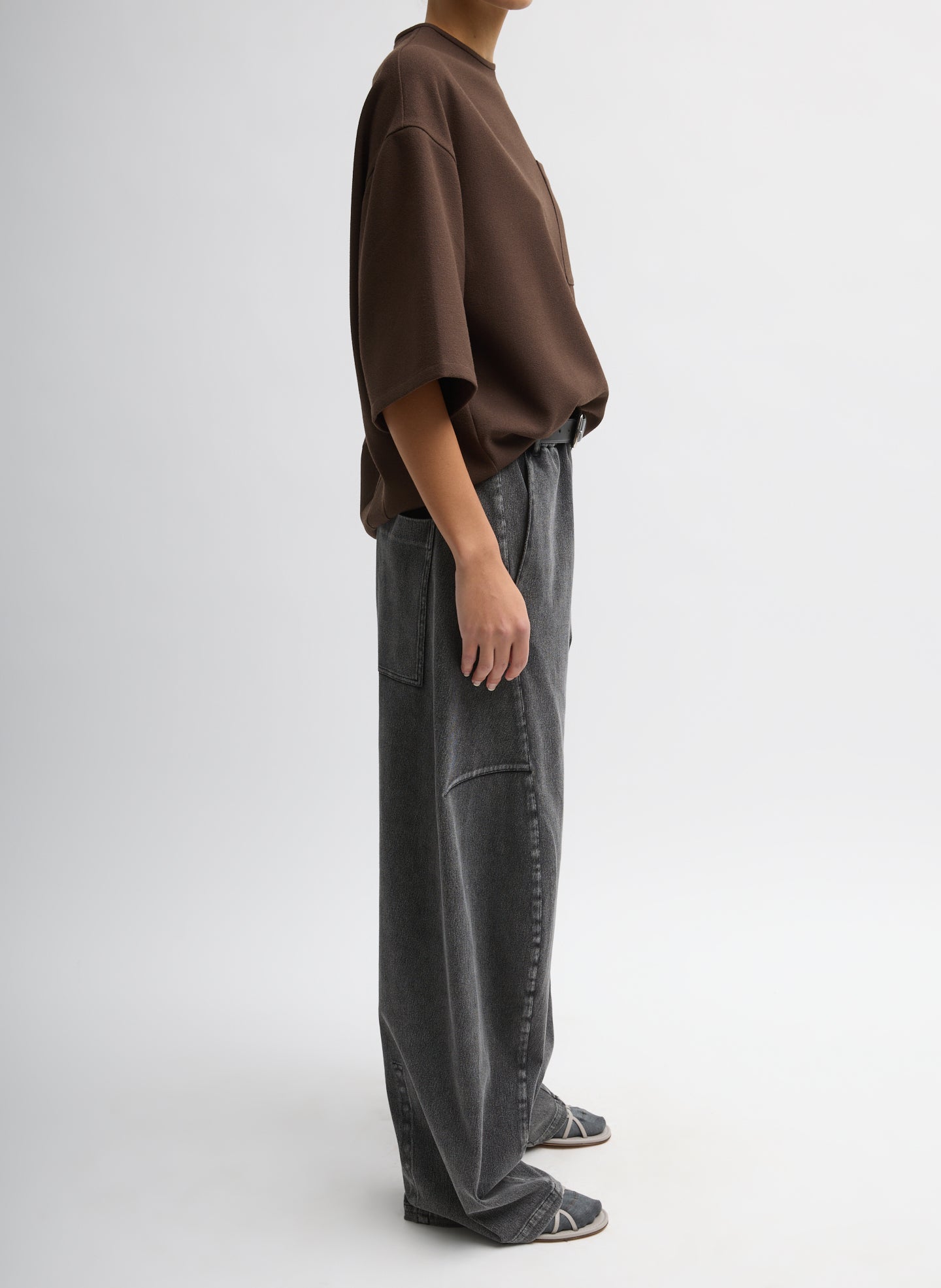 Black Stretch Denim Knit Winslow Pant - full look, side view on model