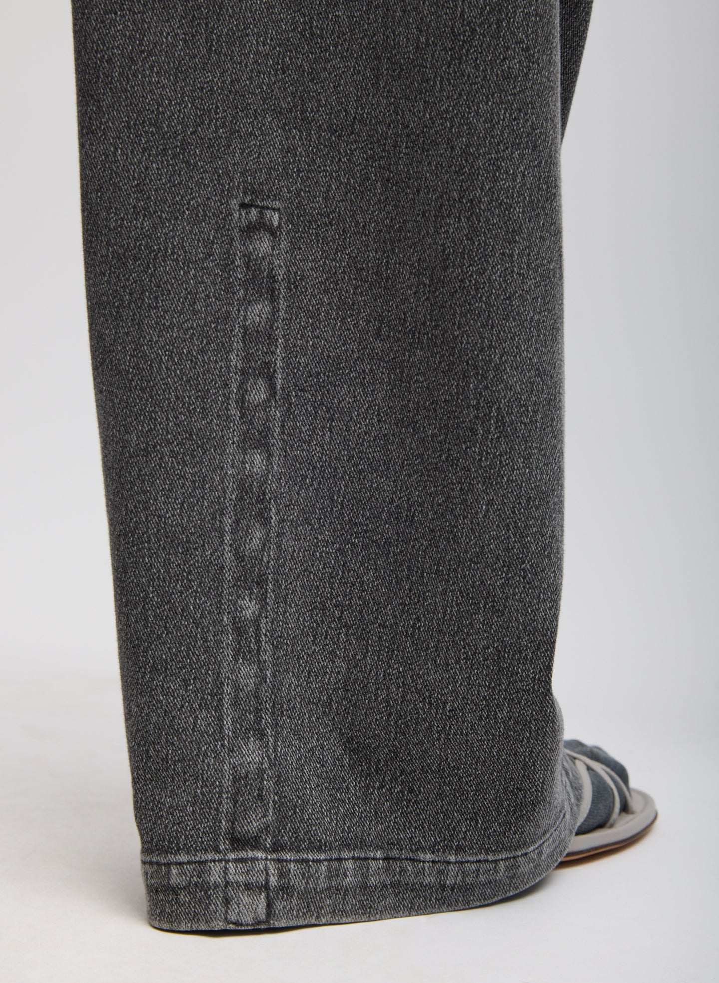 Black Stretch Denim Knit Winslow Pant - closeup of hem detail