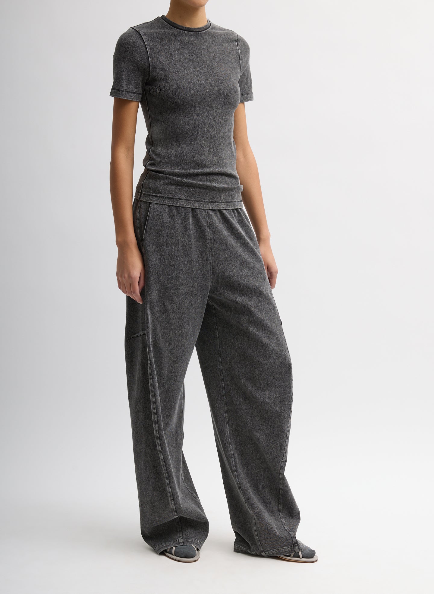 Black Stretch Denim Baby T-Shirt - full look, three-quarter view on model