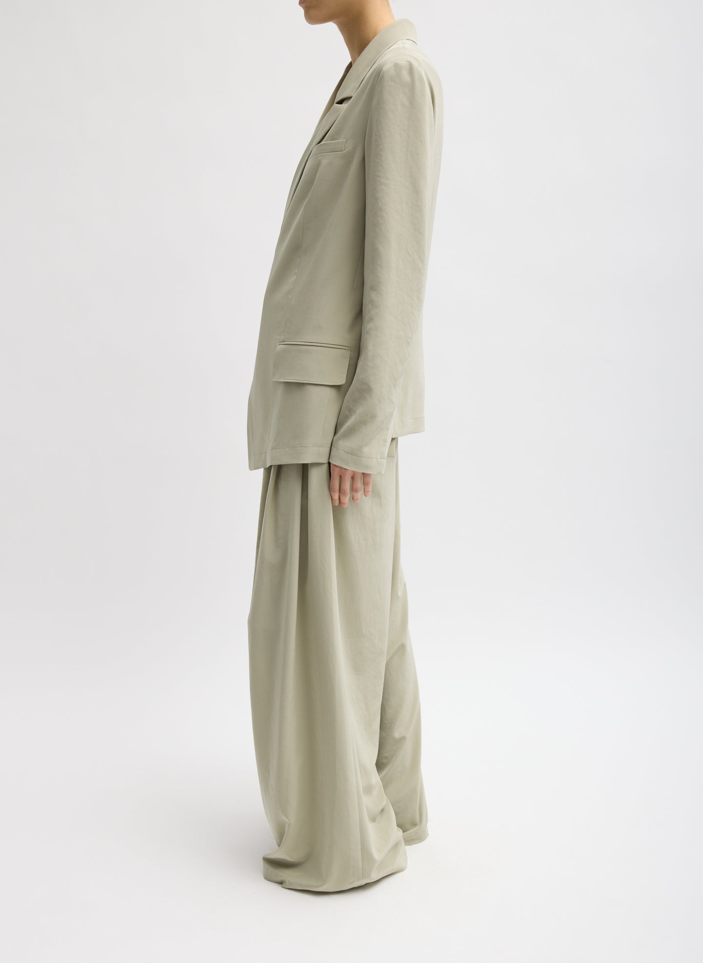 Moss Grey Relaxed Suiting Asymmetrical Wrap Blazer - full look, side view on model
