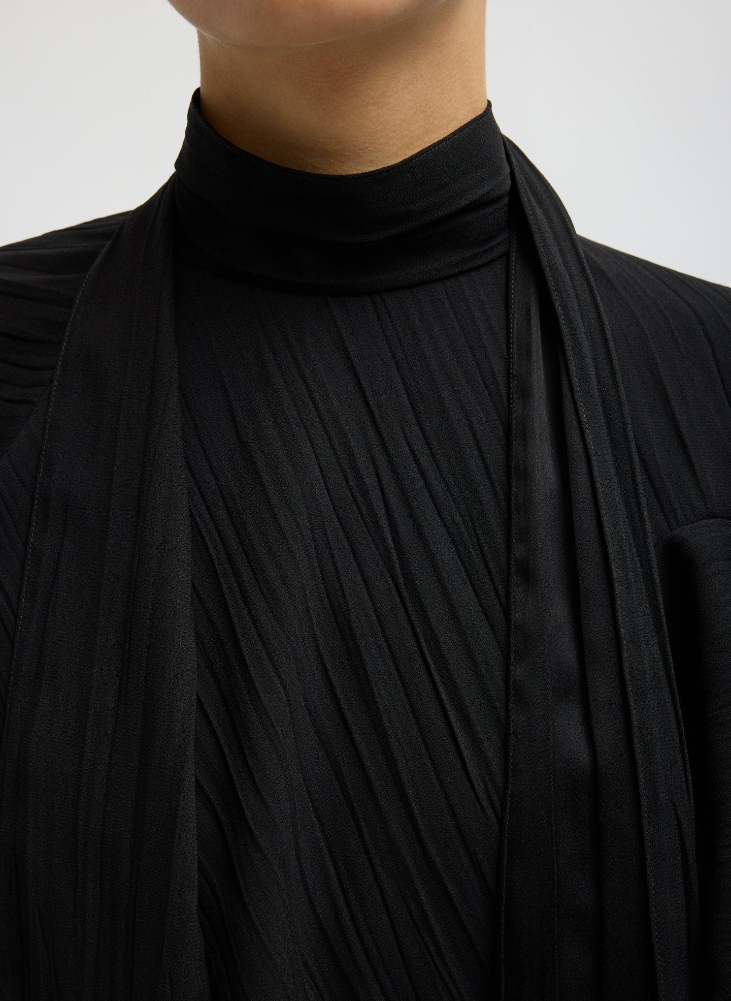 Black Creased Acetate Cape Tie Top - closeup of tie detail at neck