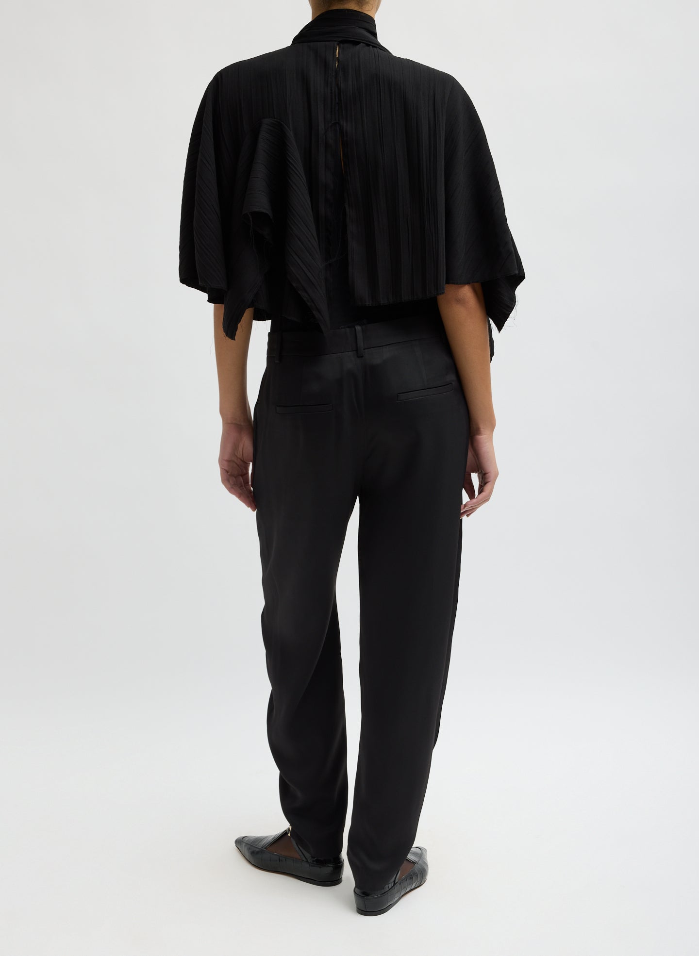 Black Creased Acetate Cape Tie Top - back view on model