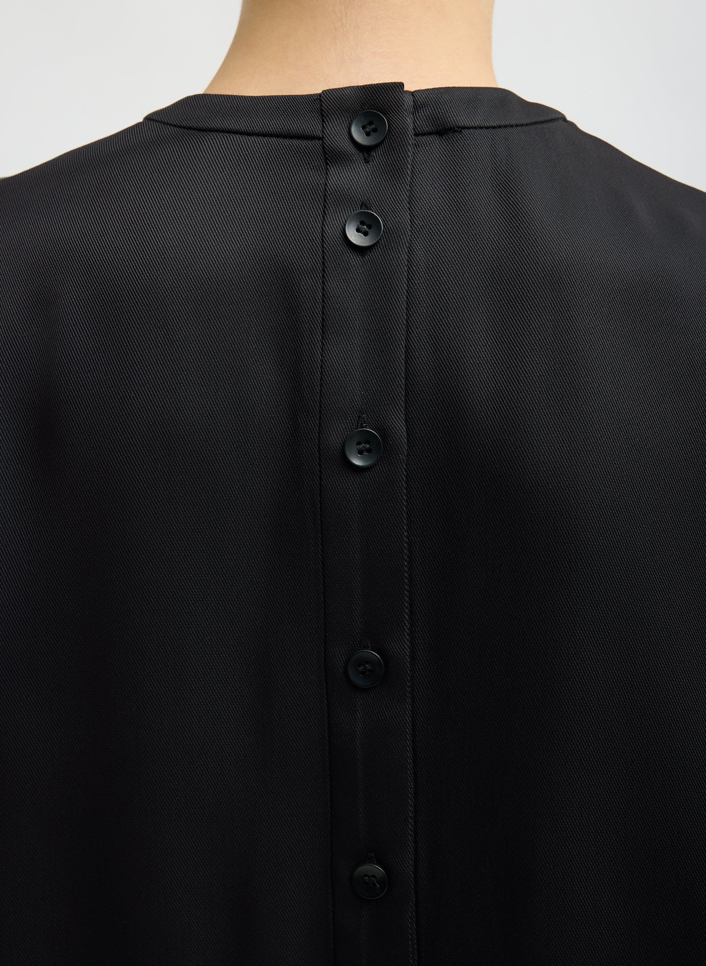 Black Eco Acetate Viscose Easy T-Shirt with Slit Detail - closeup of button details at back