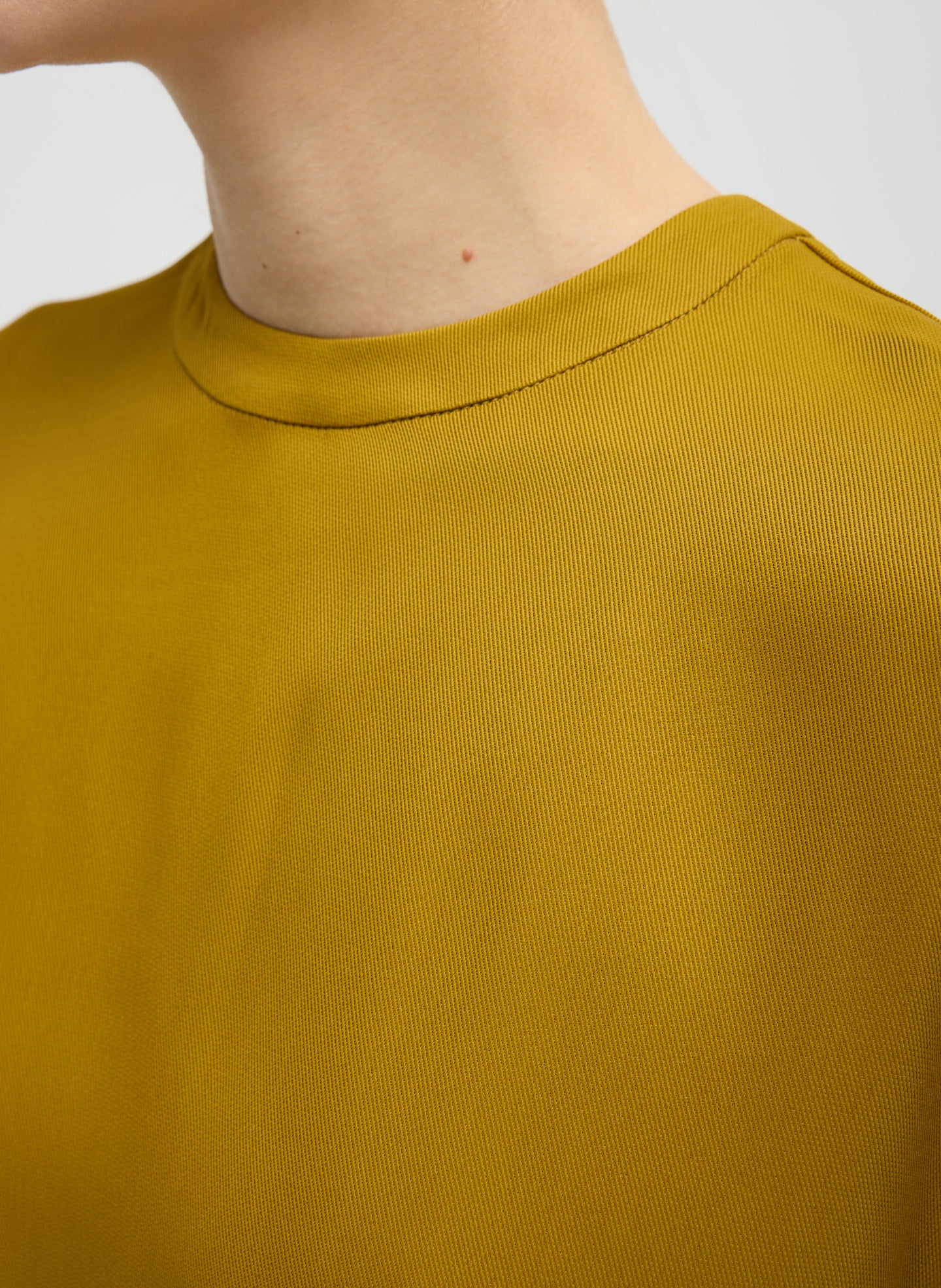 Mustard Eco Acetate Viscose Easy T-Shirt with Slit Detail - closeup of neckline