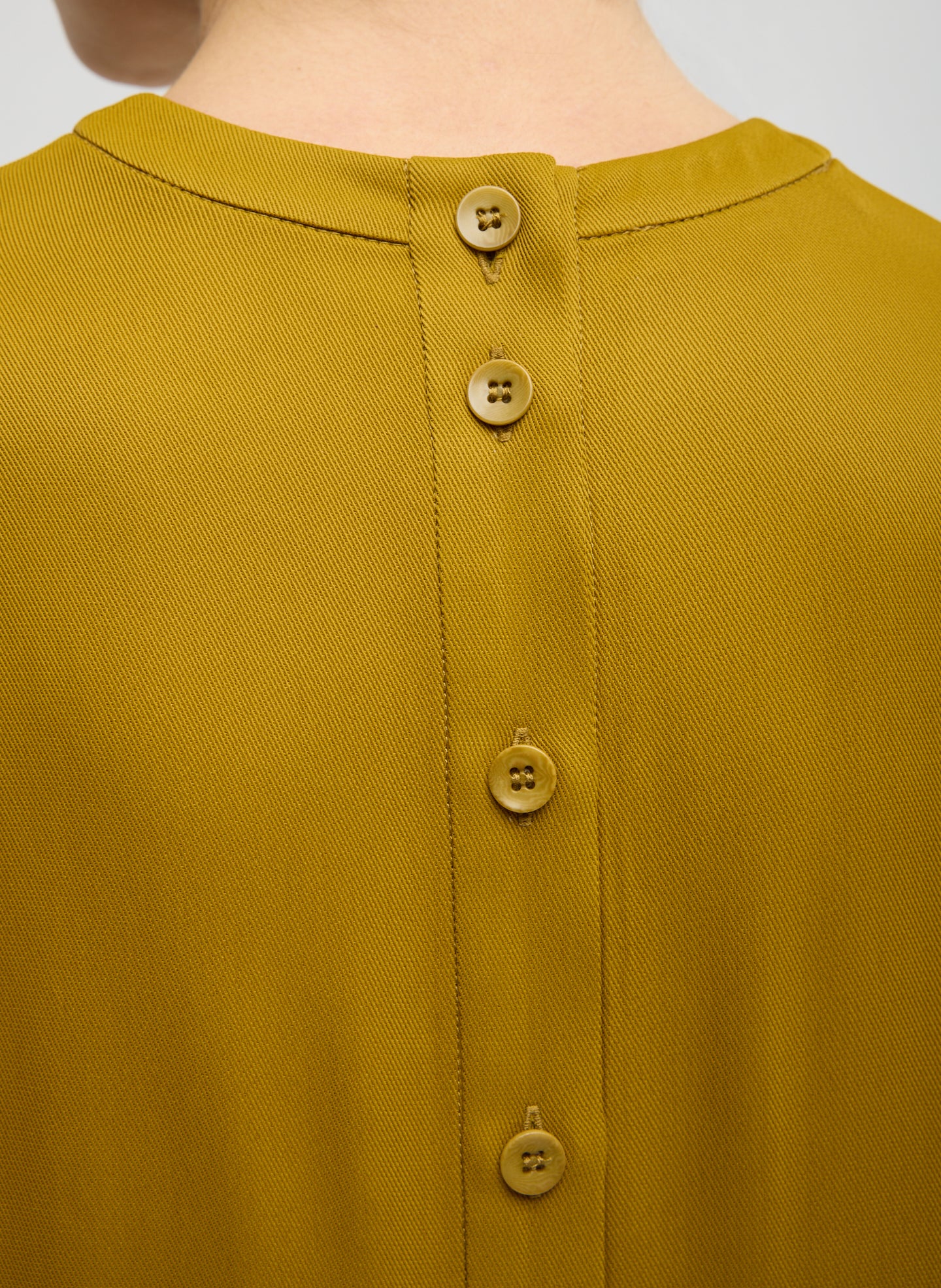 Mustard Eco Acetate Viscose Easy T-Shirt with Slit Detail - closeup of button details at back