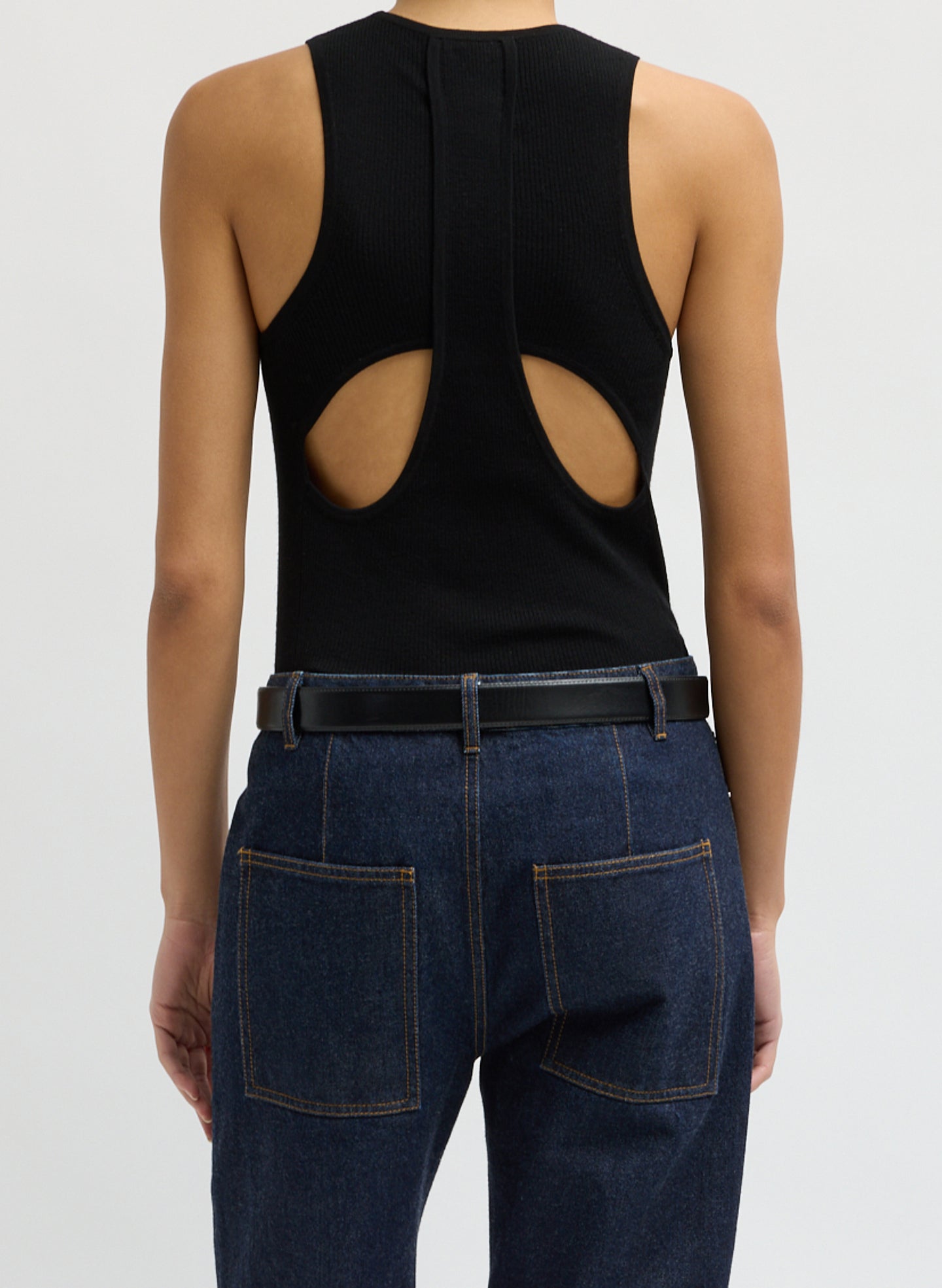 Black Feather Weight Ribbed Cut Out Tank - back view on model