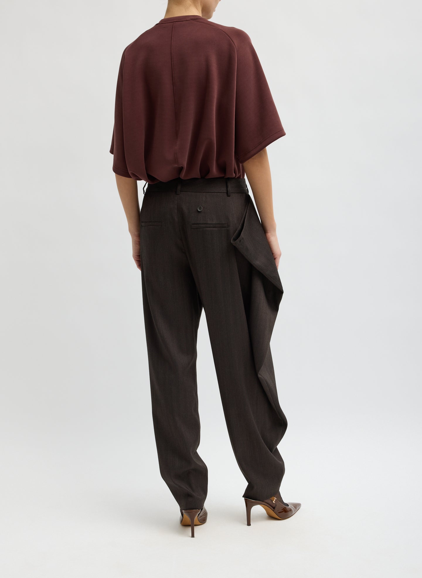 Brown Herringbone Suiting Side Drape Pleated Pant - back view on model