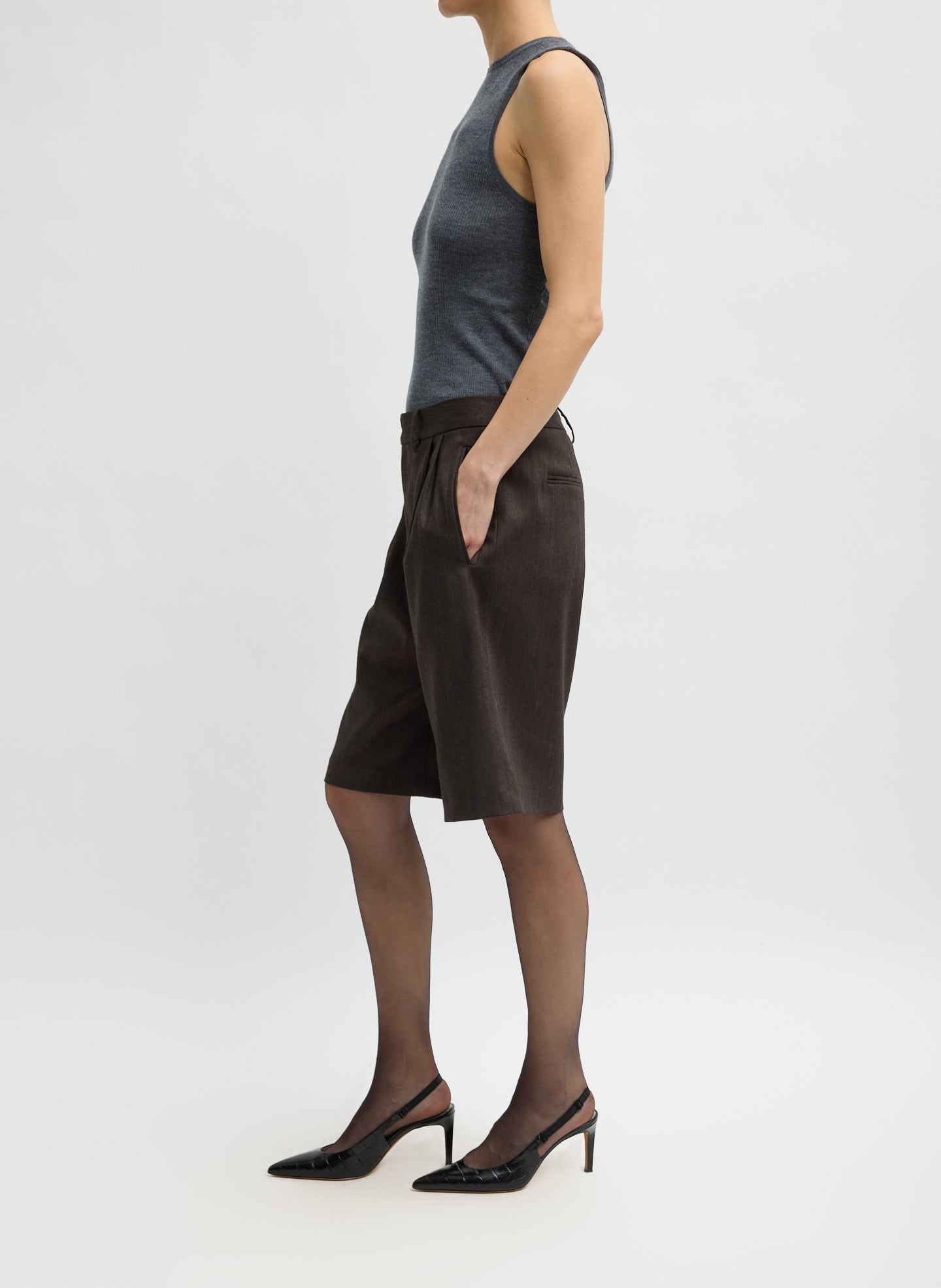 Brown Herringbone Suiting Short - long tailored short, side view on model