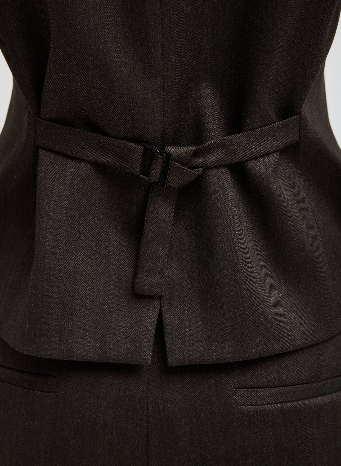 Brown Herringbone Suiting Vest - closeup of back belt detail