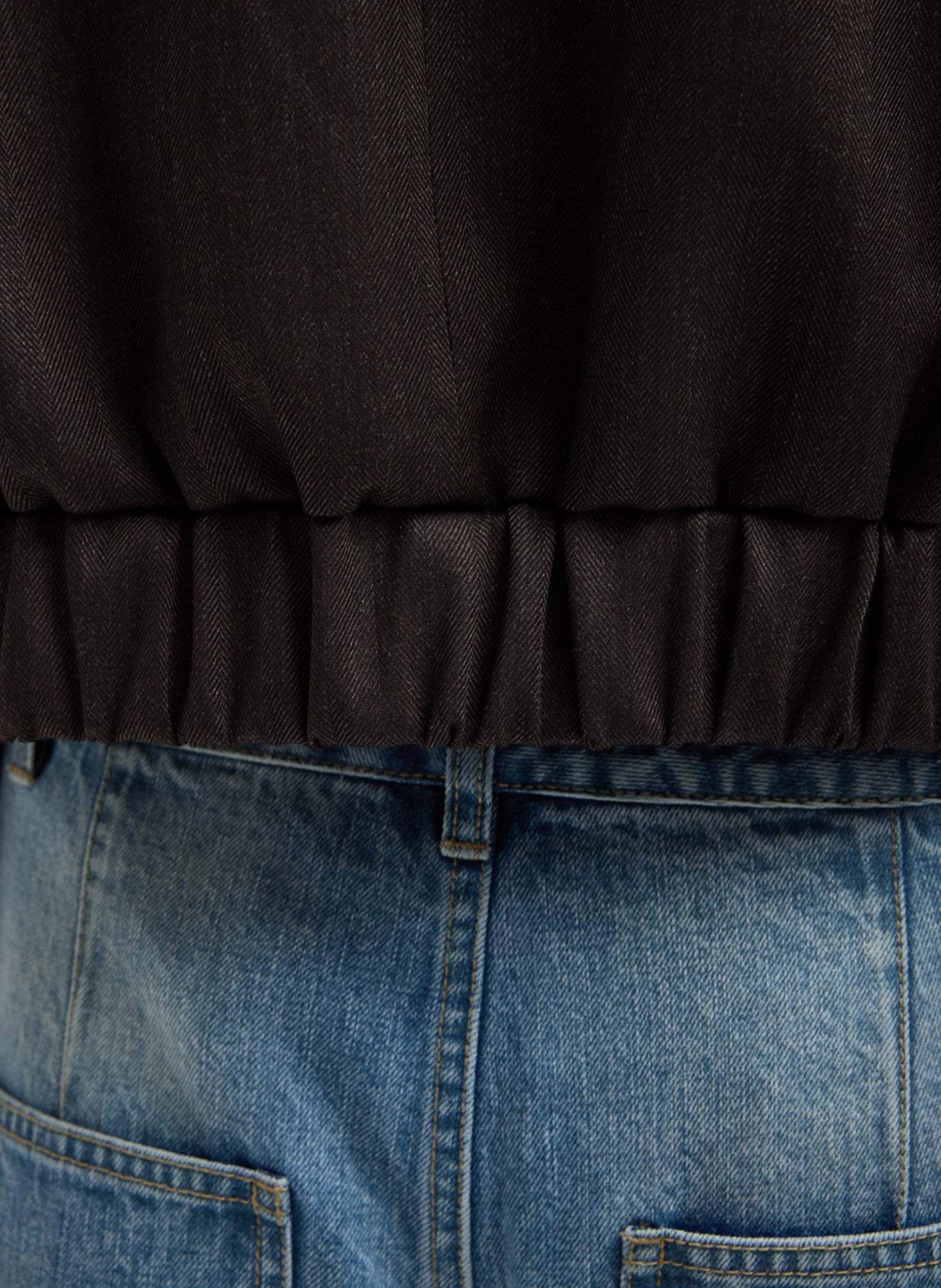 Brown Multi Herringbone Suiting Cropped Blazer - closeup of cinched hem