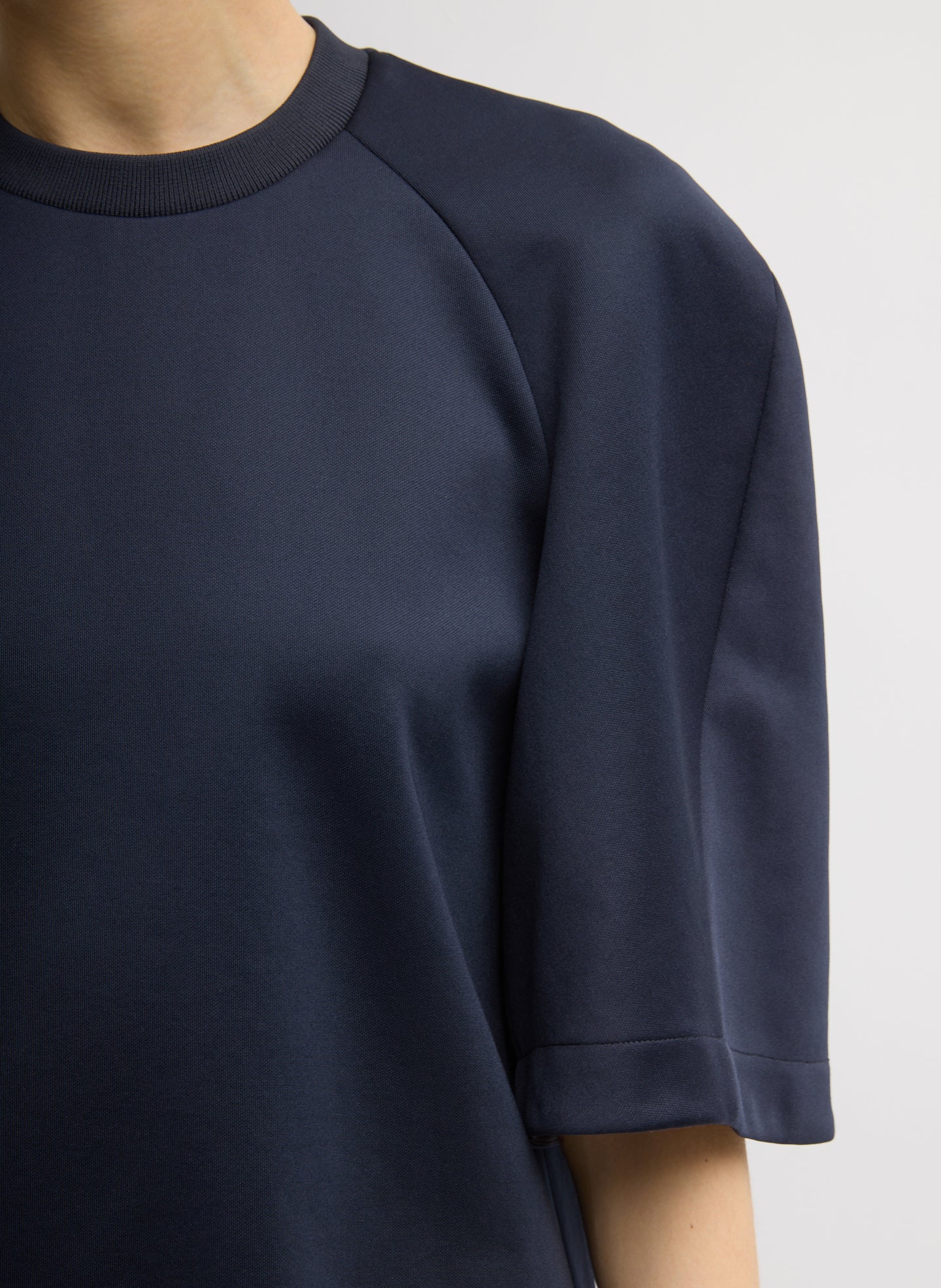 Navy Active Knit Raglan Top - closeup of raglan sleeve